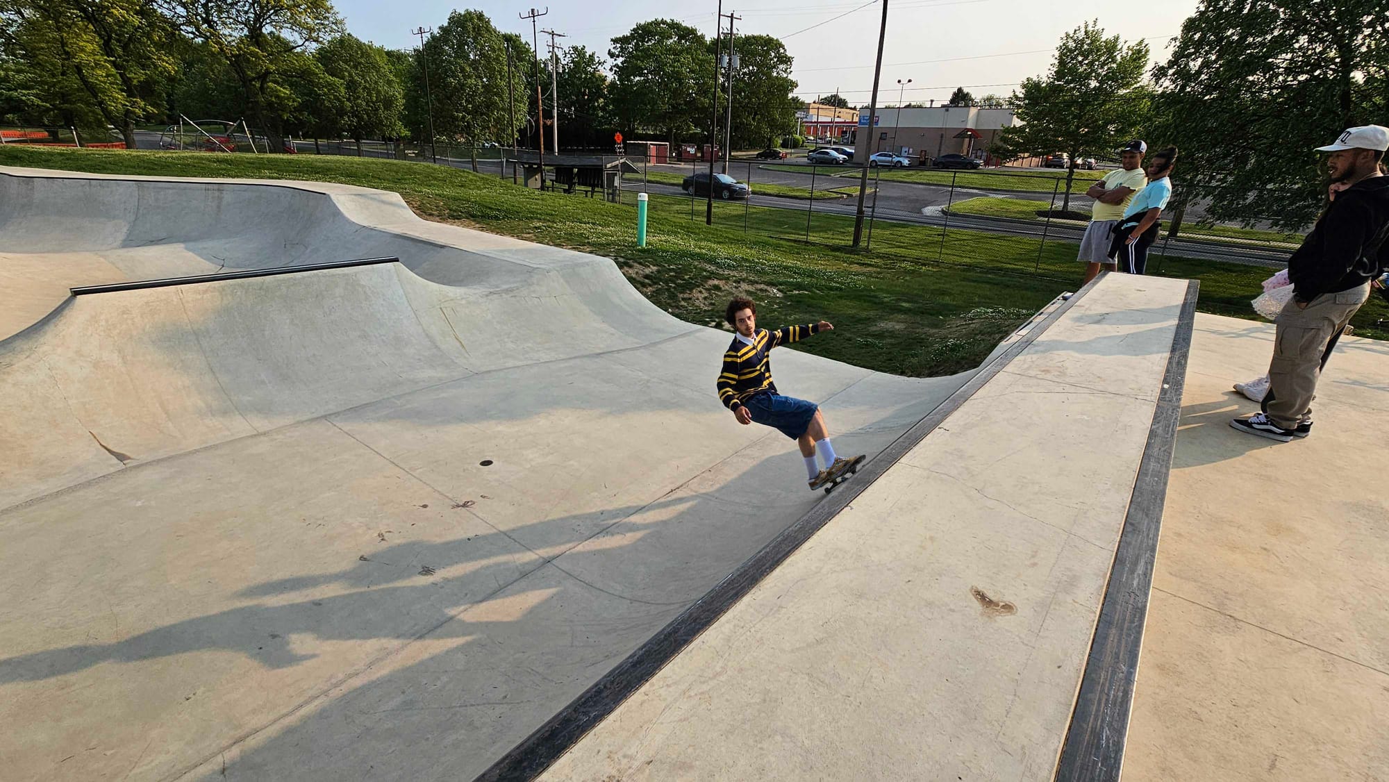 People gather to watch a skateboarder Wednesday, May 17, at Allentown's Jordan Park.