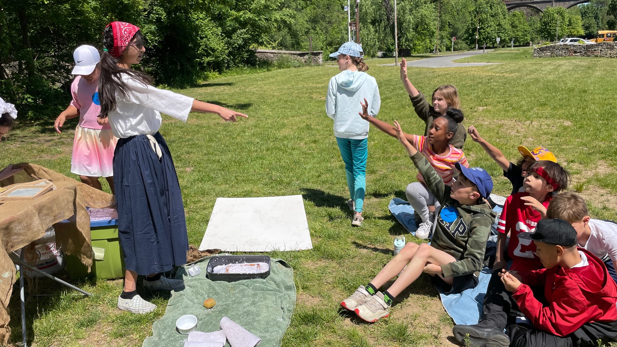 Fourth graders have questions about the papermaking process.