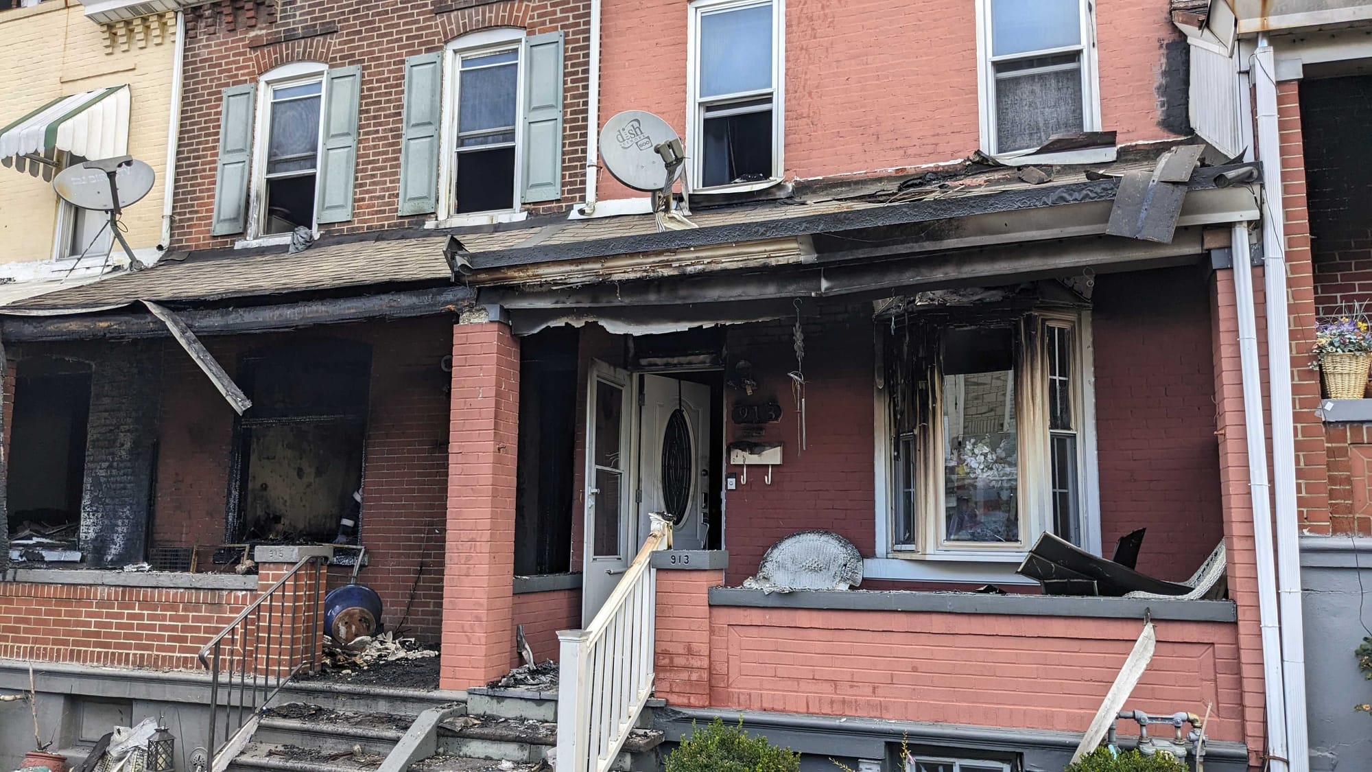 A three-alarm fire fully destroyed one home and extended to at least seven others in the city’s Jordan Heights neighborhood e