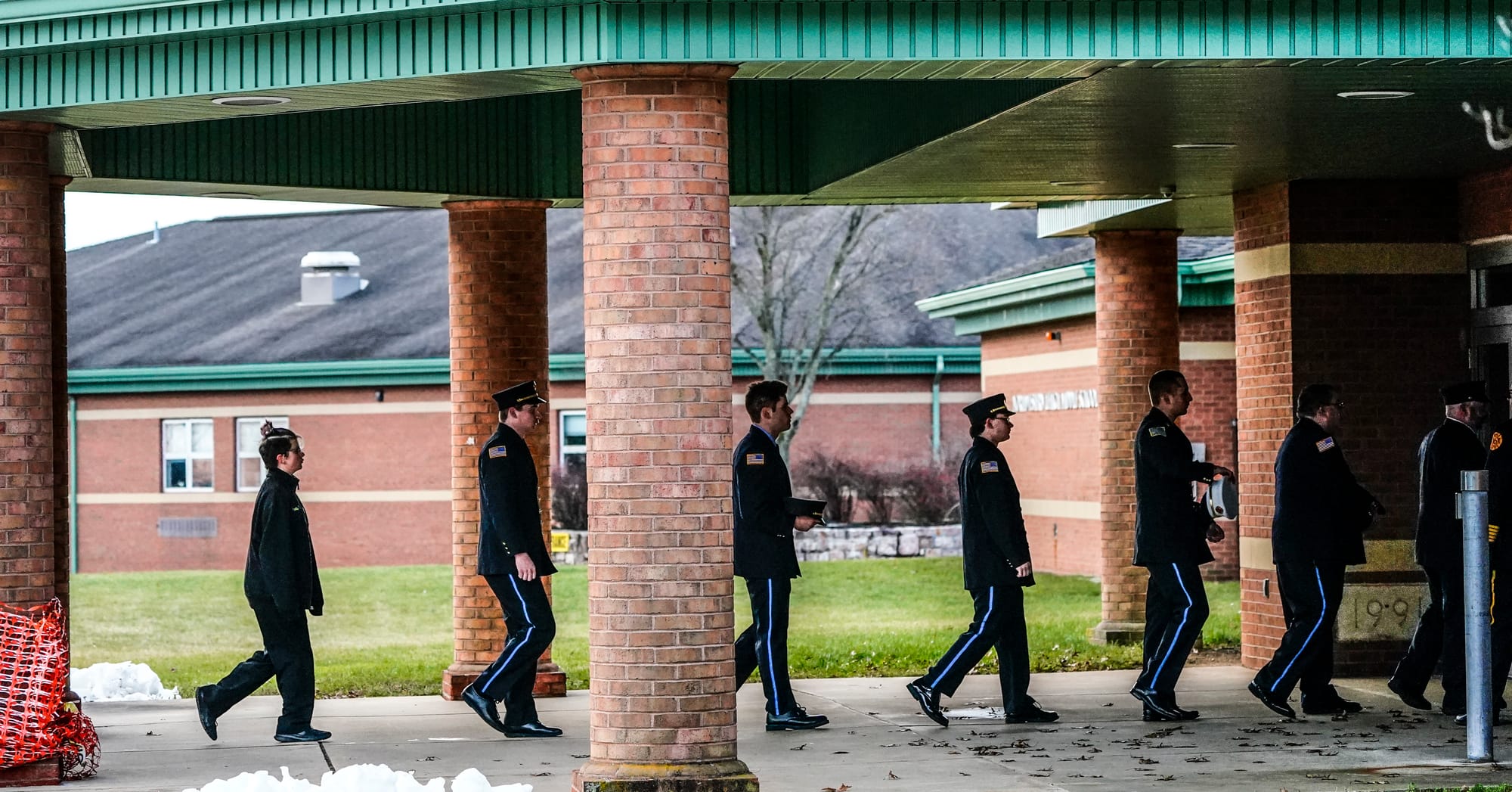 Mourners gather at Northwestern Lehigh Middle School in New Tripoli, Lehigh County, on Saturday, December 17, 2022, to pay tr
