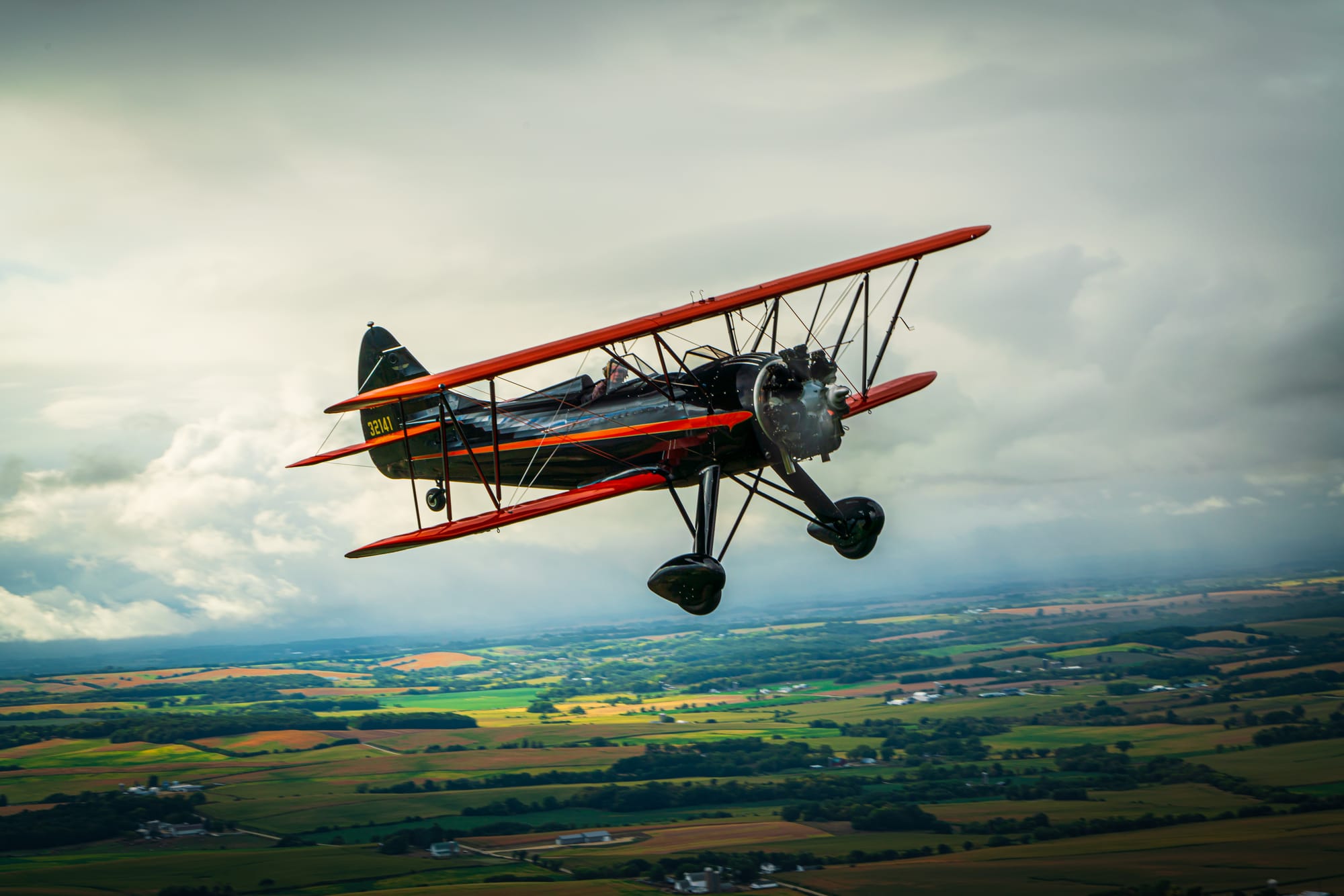 Dan Wilkins flying his WACO UPF-7 Biplane.