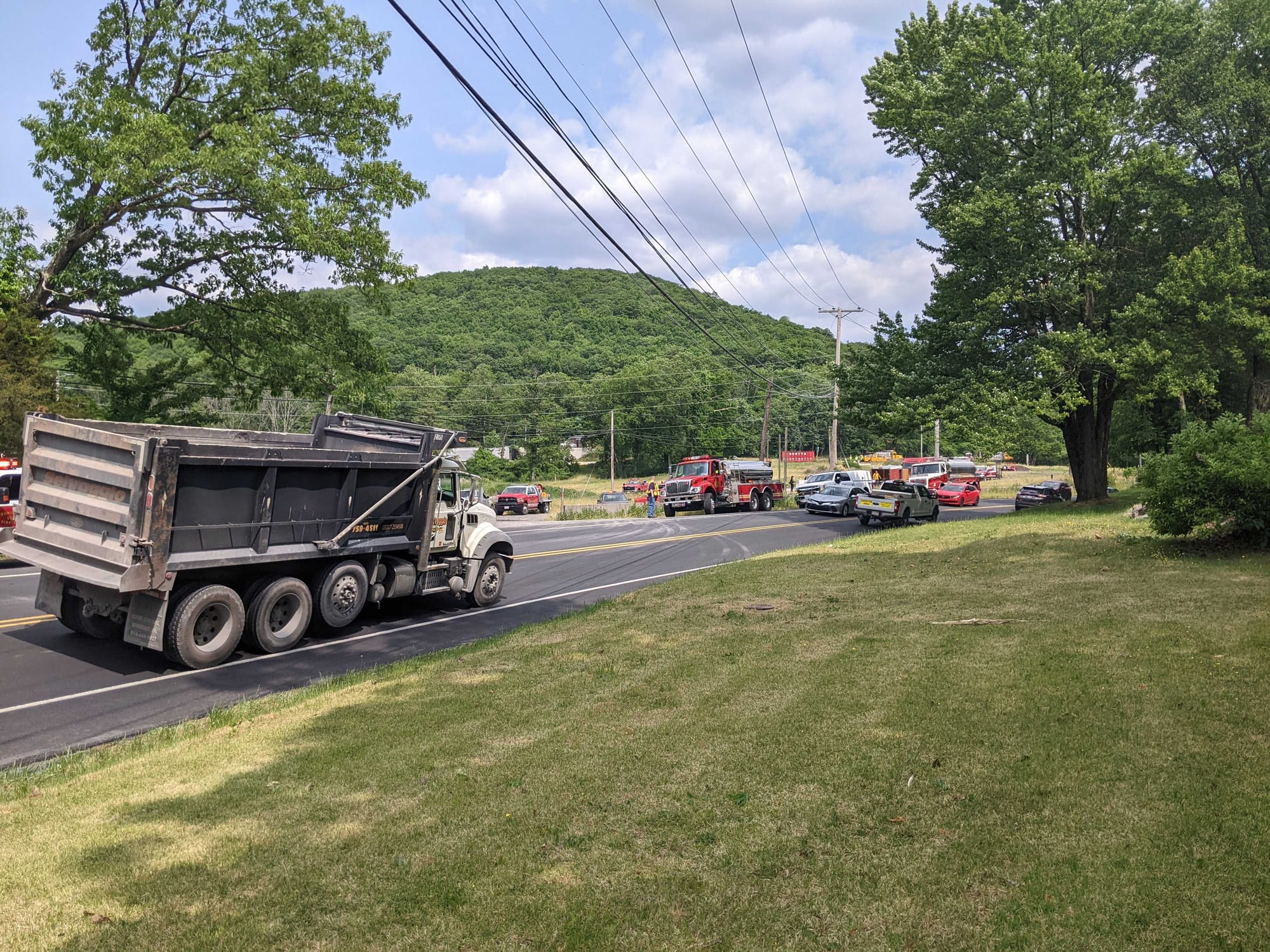 Fire vehicles from many companies worked on the brush fire along Route 33 on June 5, 2023.