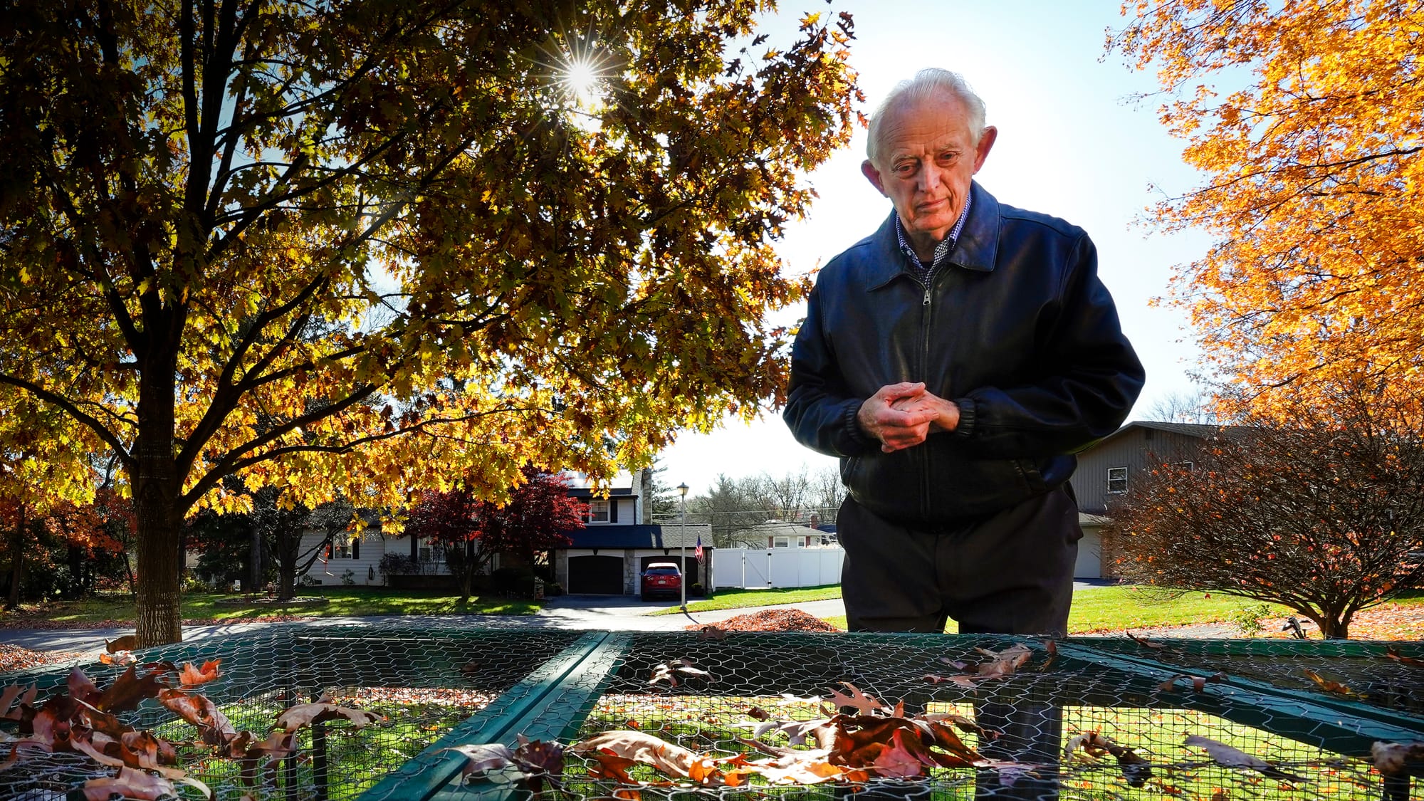 Fred Buse checks on his vegetable garden at the front of his home. Fred Buse, 87, of South Whitehall Township, has been track