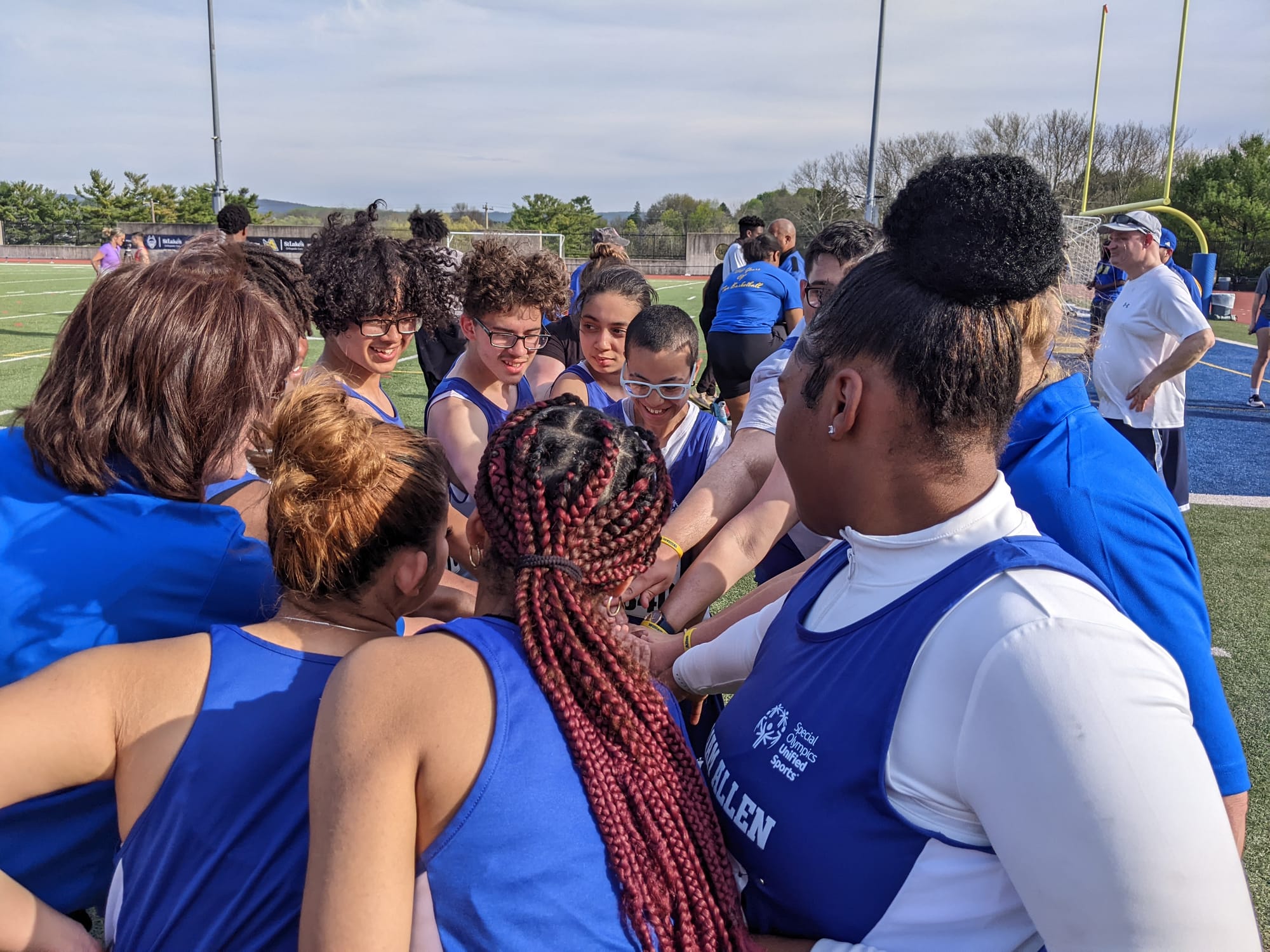 William Allen's Unified Track Team cheering following the meet Friday