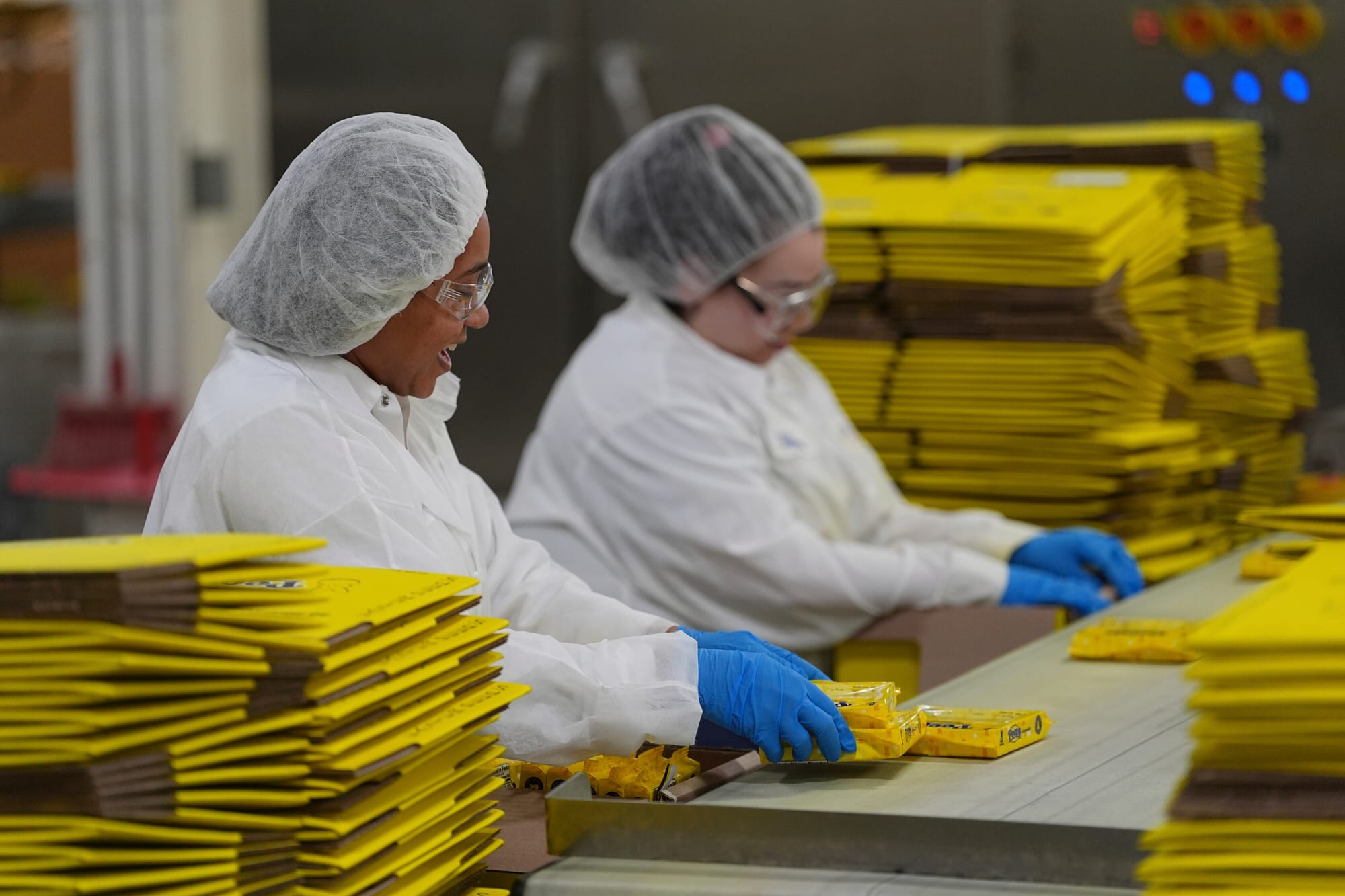 Workers package Peeps marshmallow treats at the Just Born factory in Bethlehem, Pa., Thursday, April 10, 2025. (AP Photo/Matt