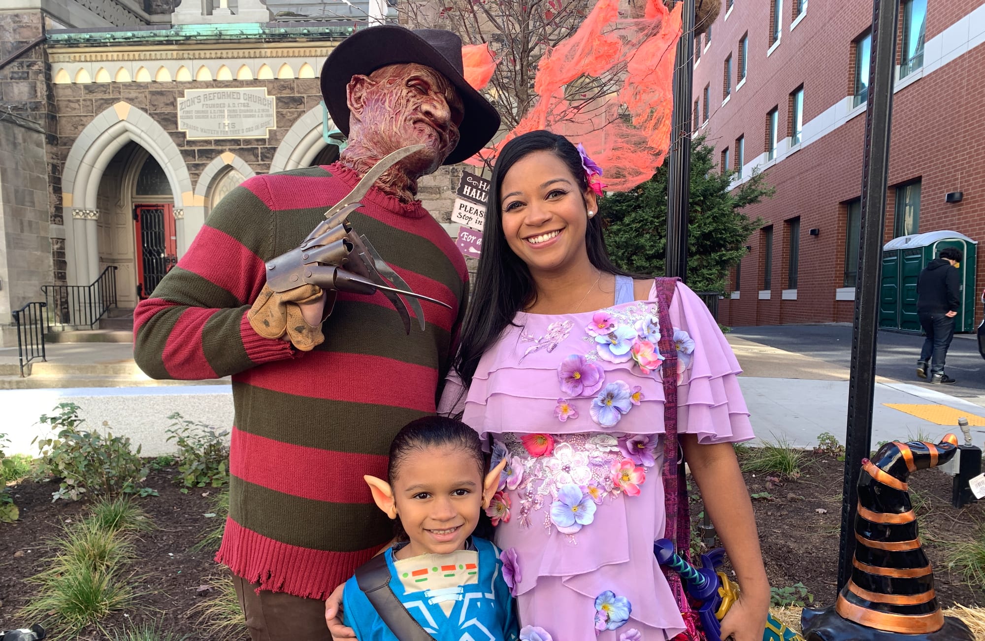 Allentown resident Luisa Morla and her son, Adonis, with Freddy Kruger. Just kidding, that's Morla's husband, Angel Merced.