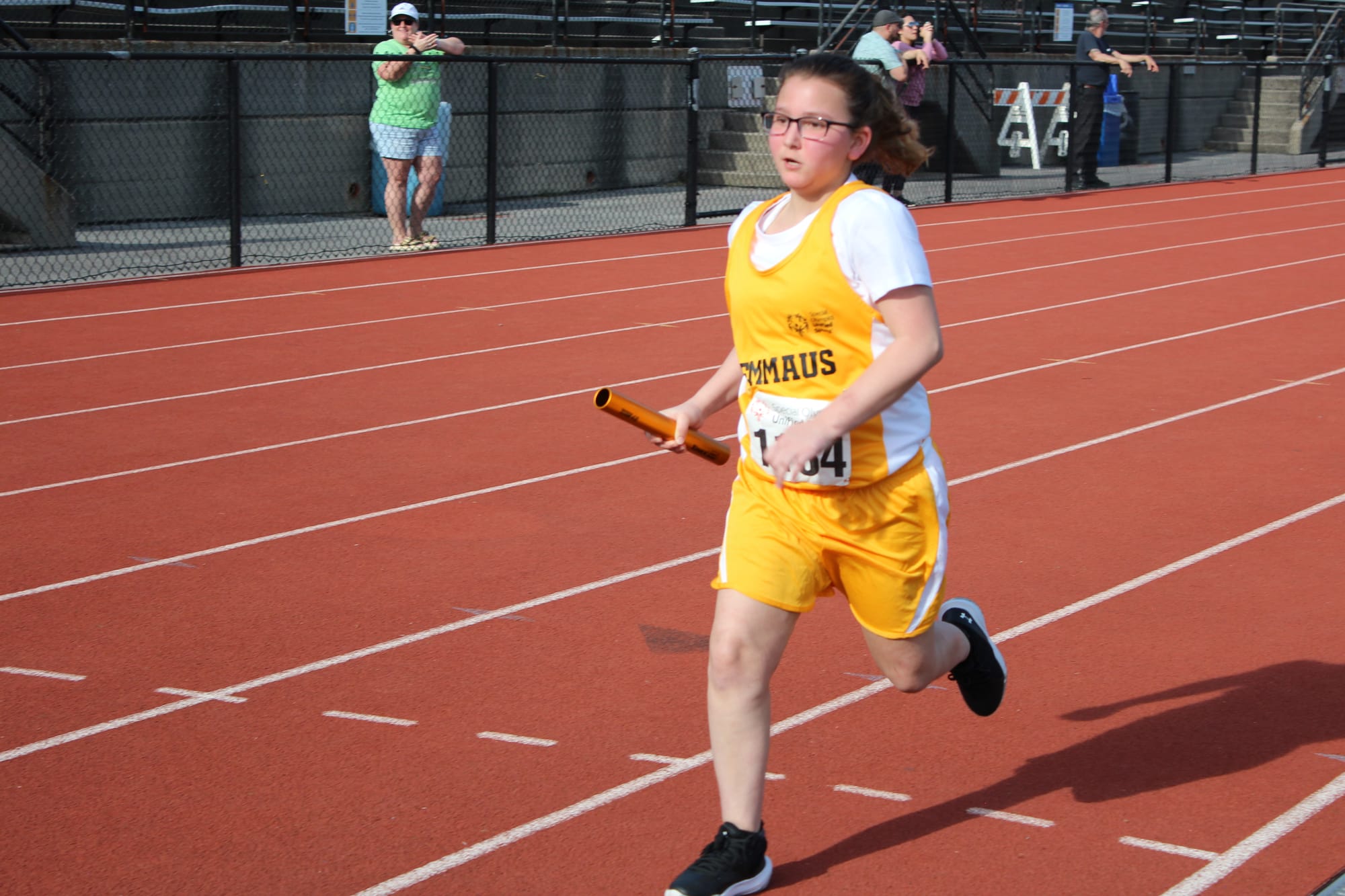 Jaclyn Chiego finishing the 400m relay for Emmaus High School