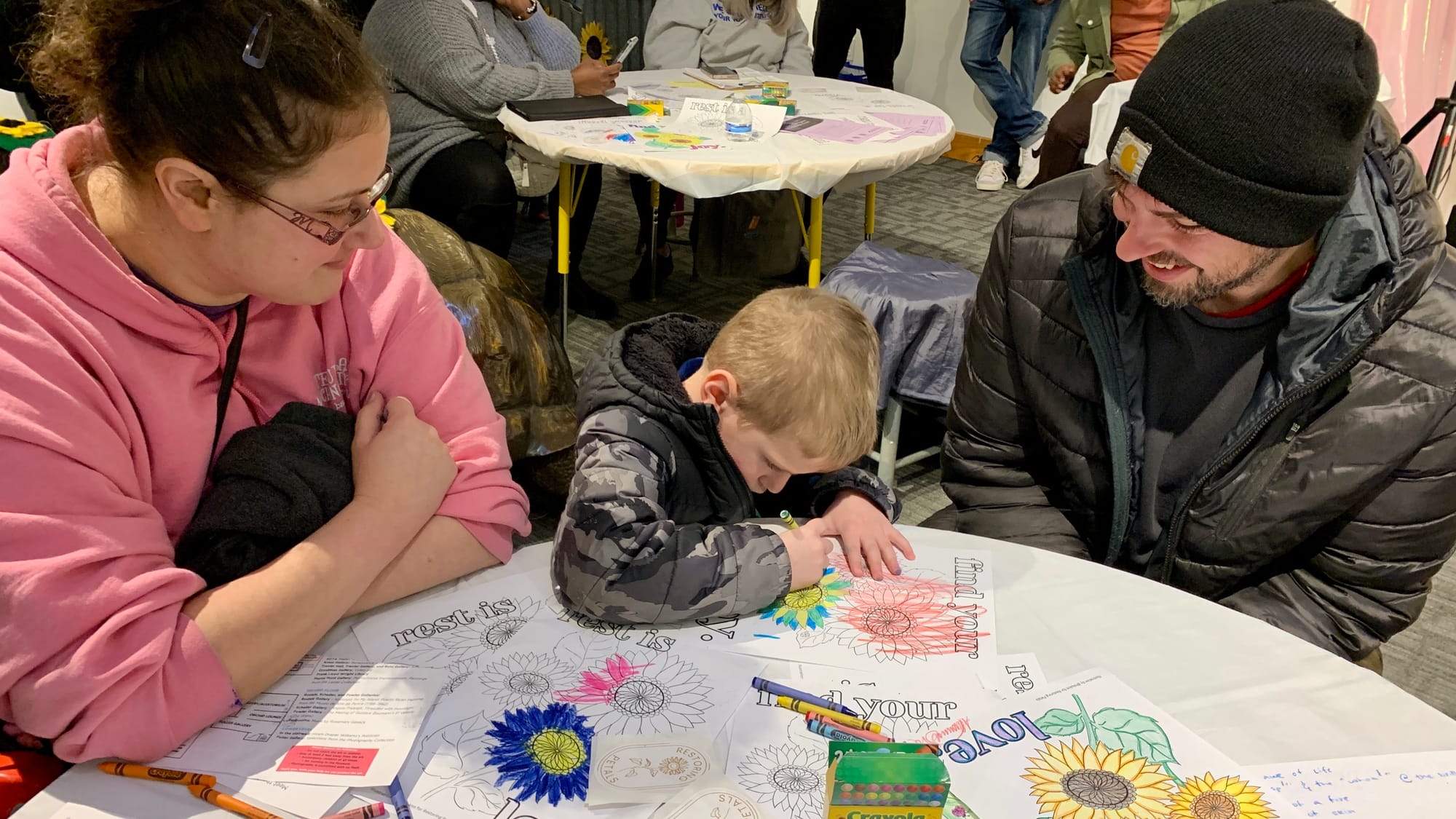 Coloring pages with sunflowers were available in the 'Restoring Petals' exhibition.
