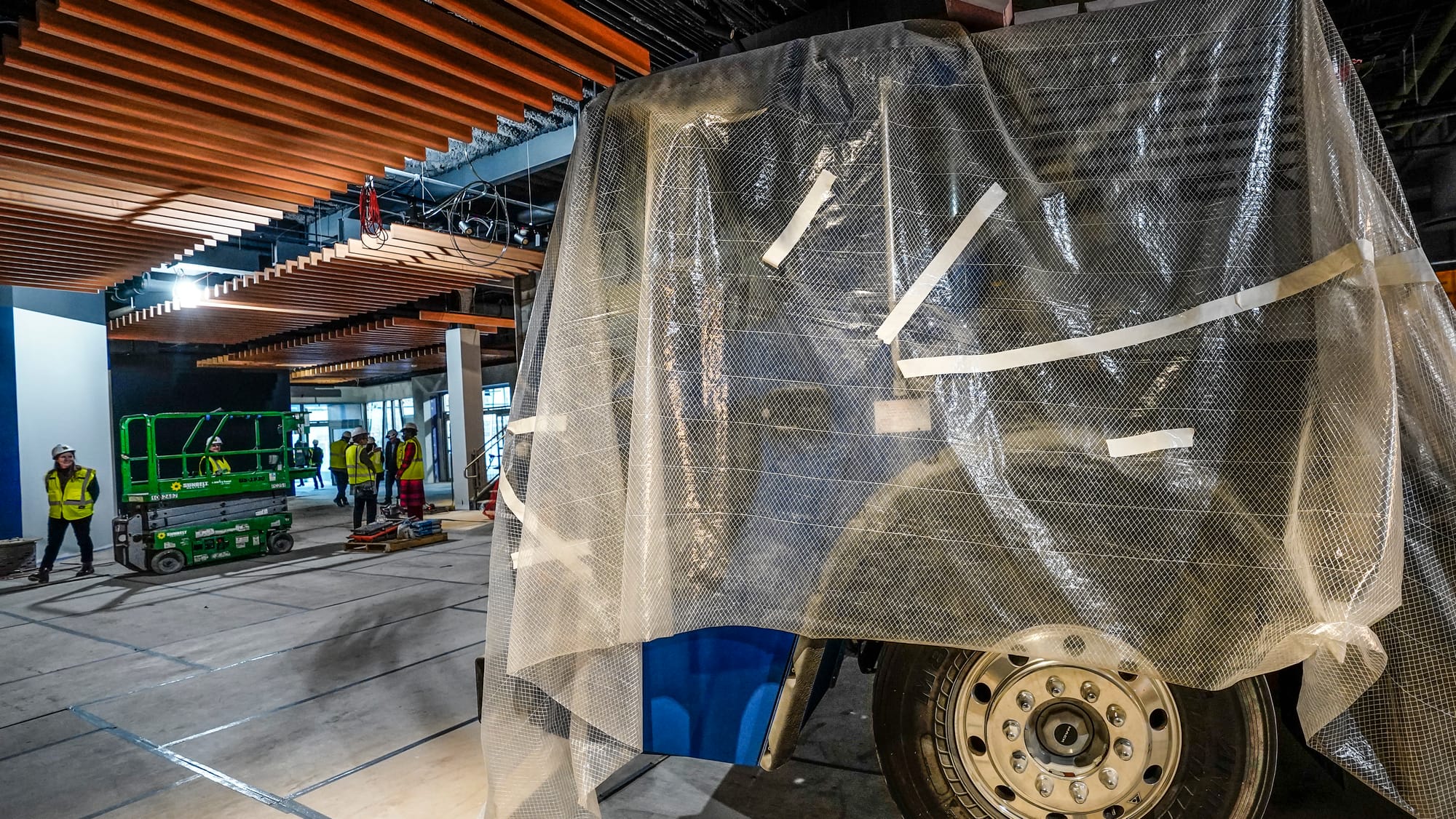 A Mack Truck greets guests in the Welcome Center in the main lobby. Representatives of the Da Vinci Science Center lead membe