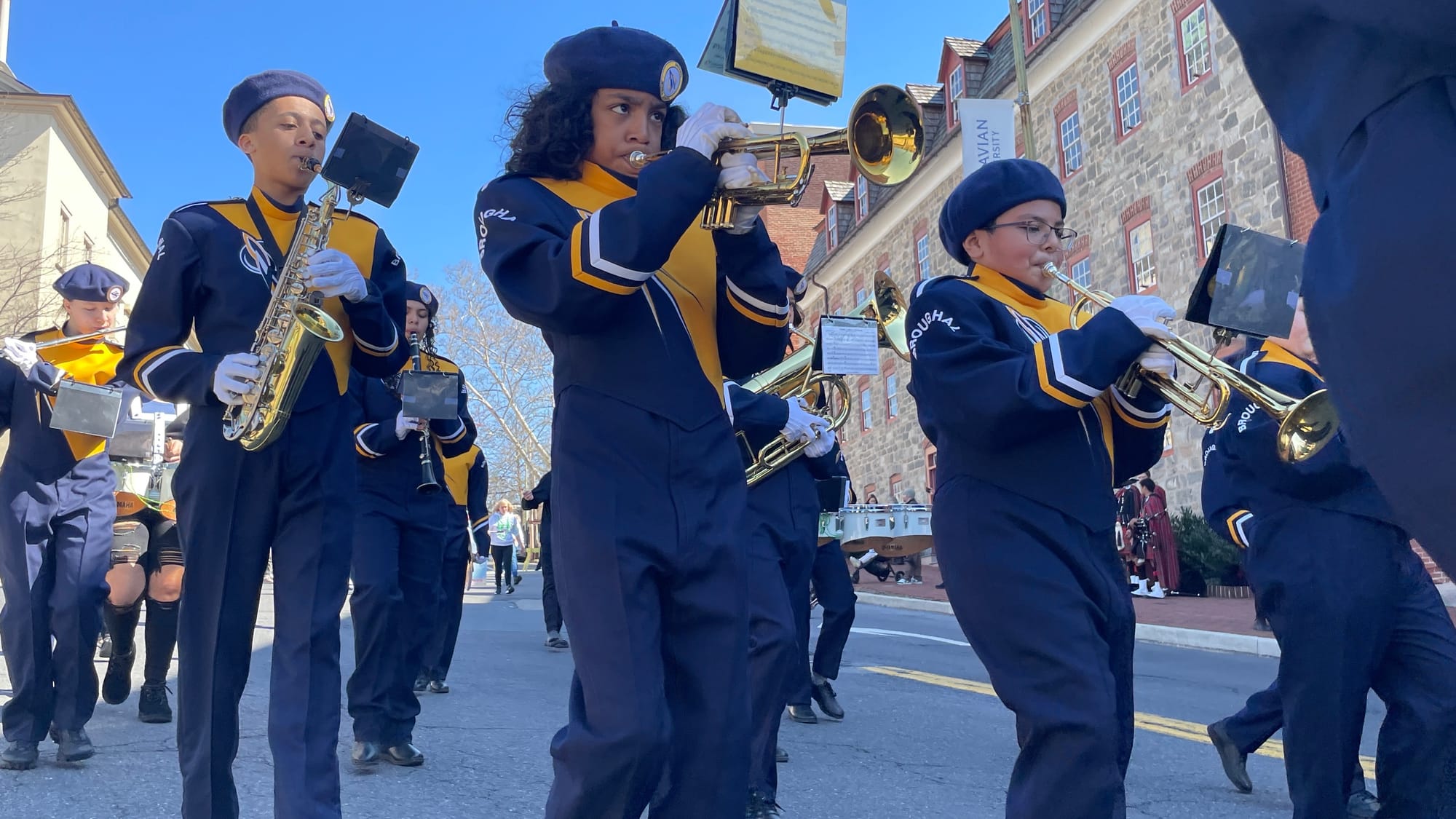 The Broughal Middle School Marching Rocket Band makes its way south on Main Street during the Parade of Shamrocks on March 16