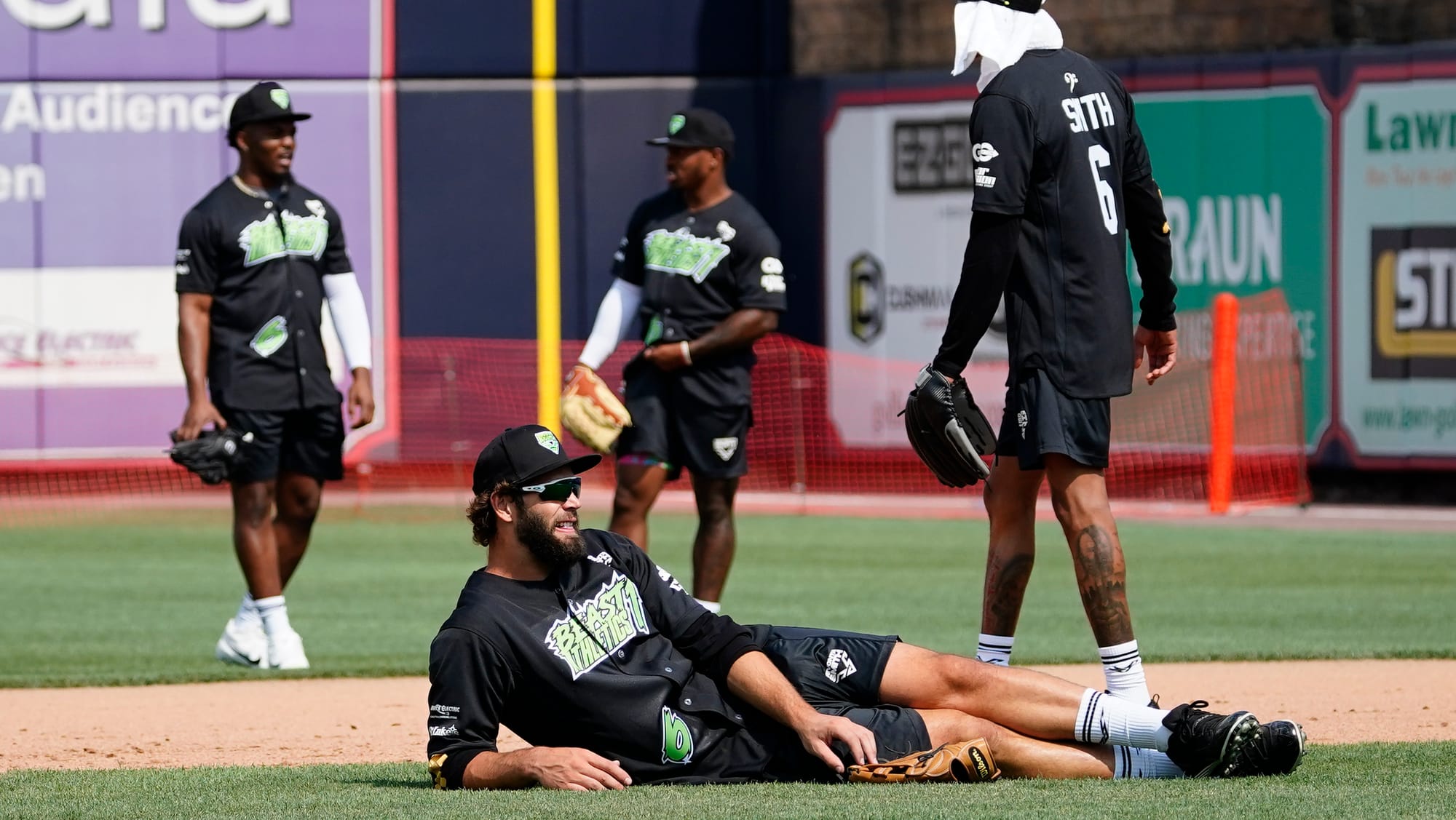 Dallas Goedert rests between innings. The 2nd annual DeVonta Smith Celebrity Softball Game was held at Coca-Cola Park in Alle