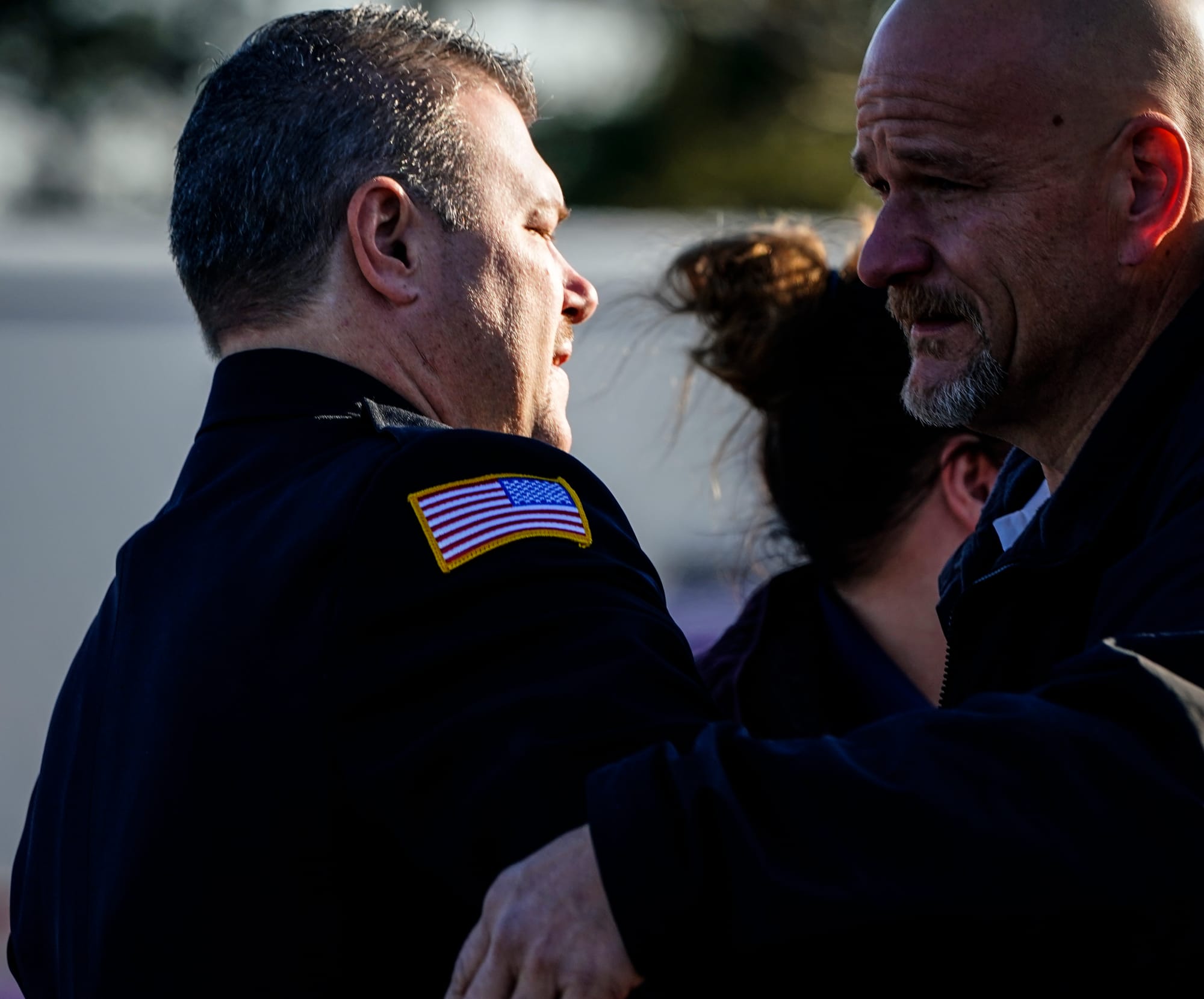 New Tripoli Fire Chief Gary Kuntz, Jr. left, greets mourners.