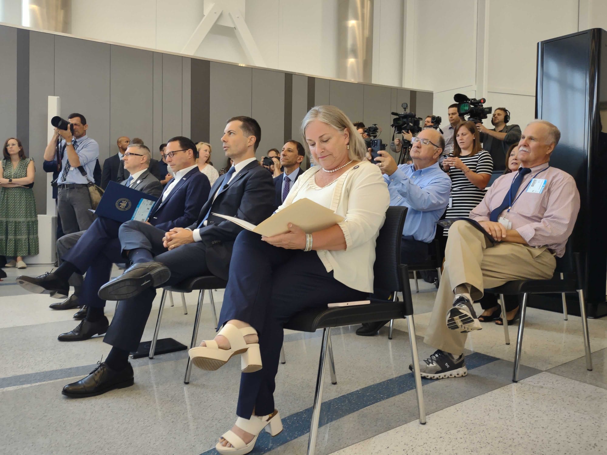 Gov. Josh Shapiro, U.S. Secretary Pete Buttigieg and Rep. Susan Wild take their seats ahead of the grand opening of a $35 mil