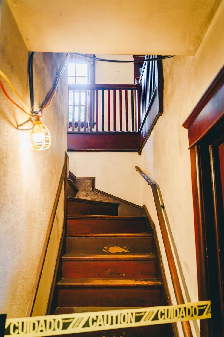 Servant's hall staircase access within the home.