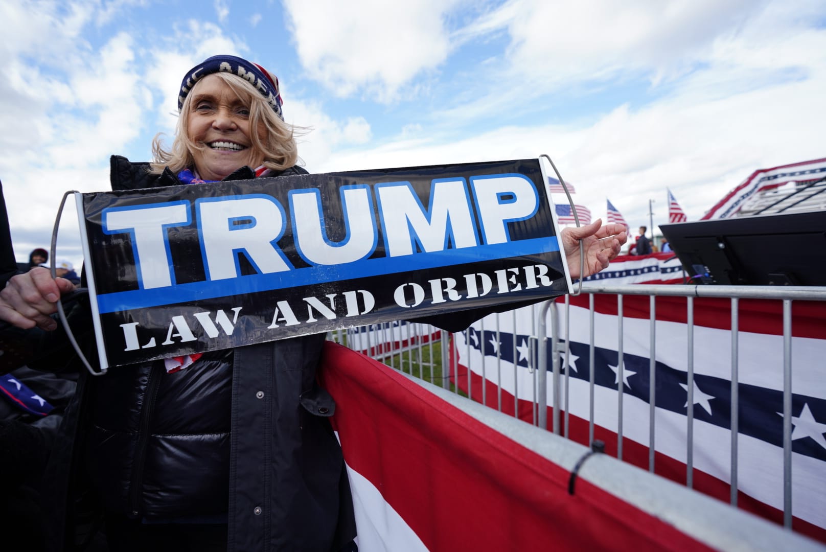 People wait for Donald Trump prior to a rally in Schnecksville on Saturday, April 13, 2024.