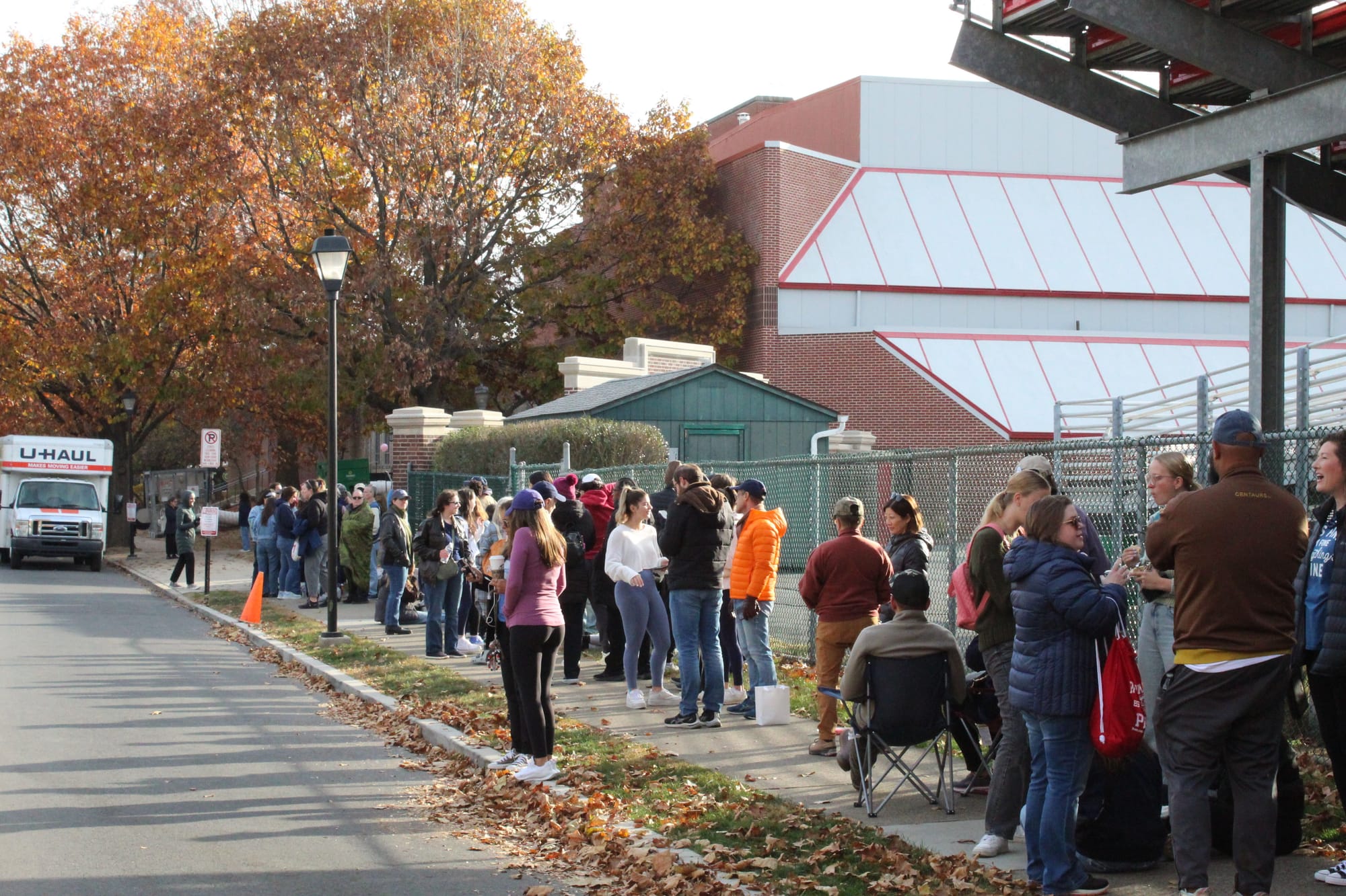 People wait in line for the Kamala Harris rally on the Muhlenberg College campus on Monday, Nov. 4, 2024.