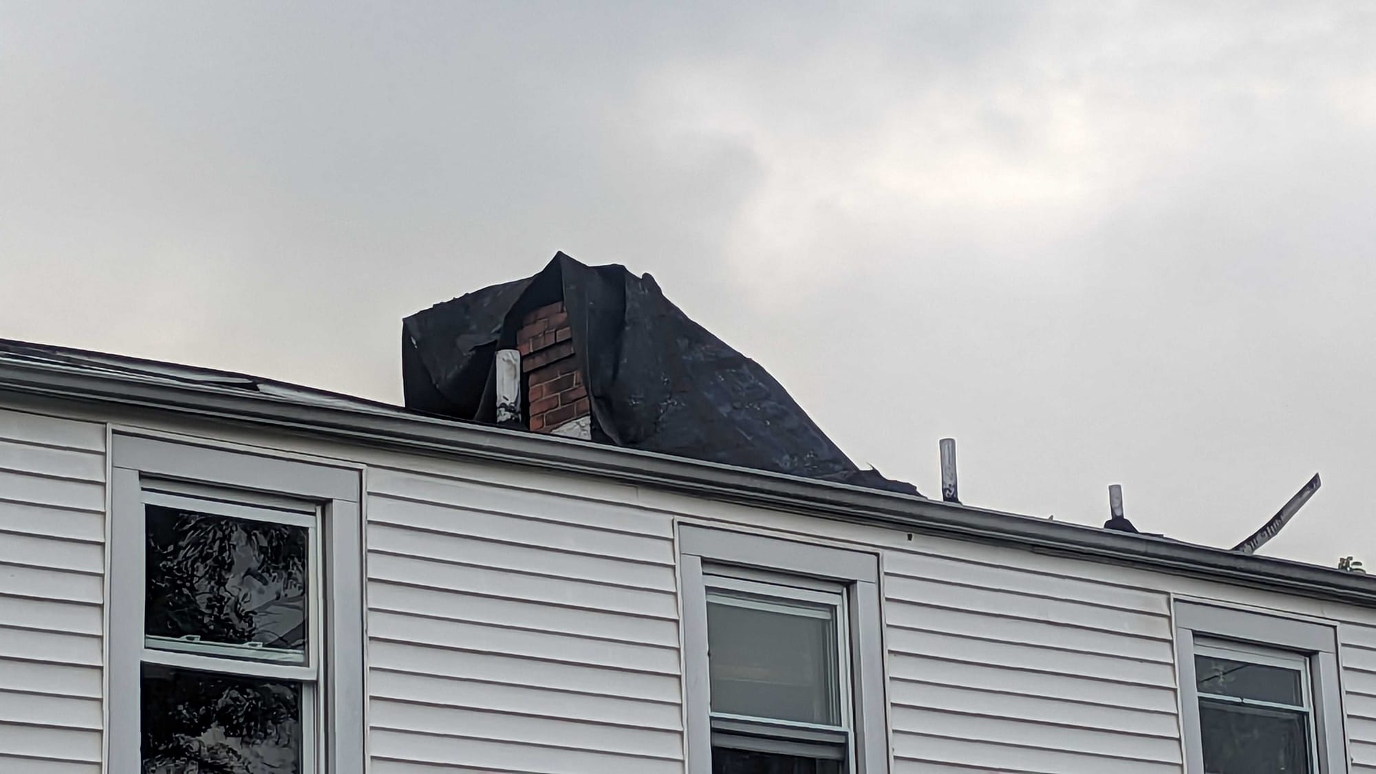 Roof over the chimney.