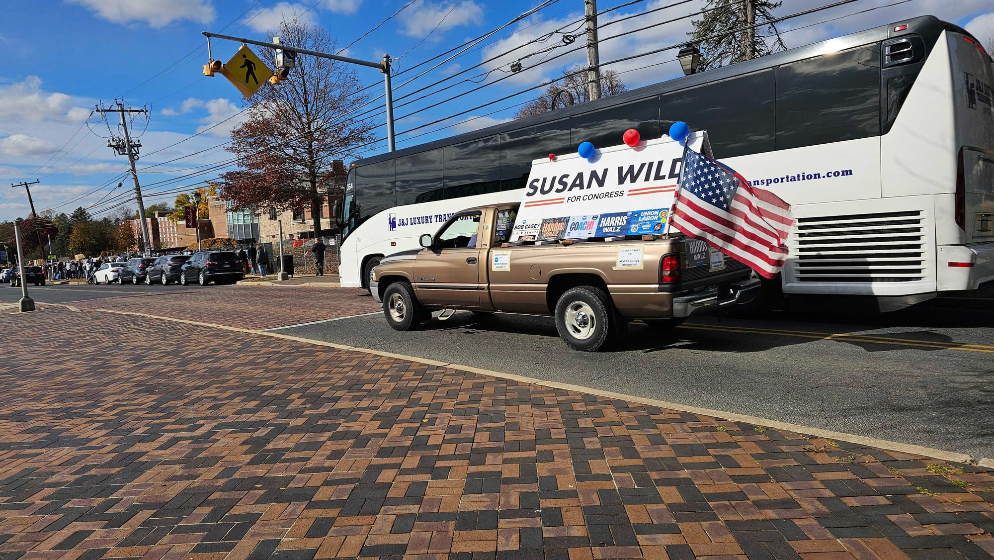 A truck driver shows support for Congresswoman Susan Wild outside of a rally for Vice President Kamala Harris on the campus o