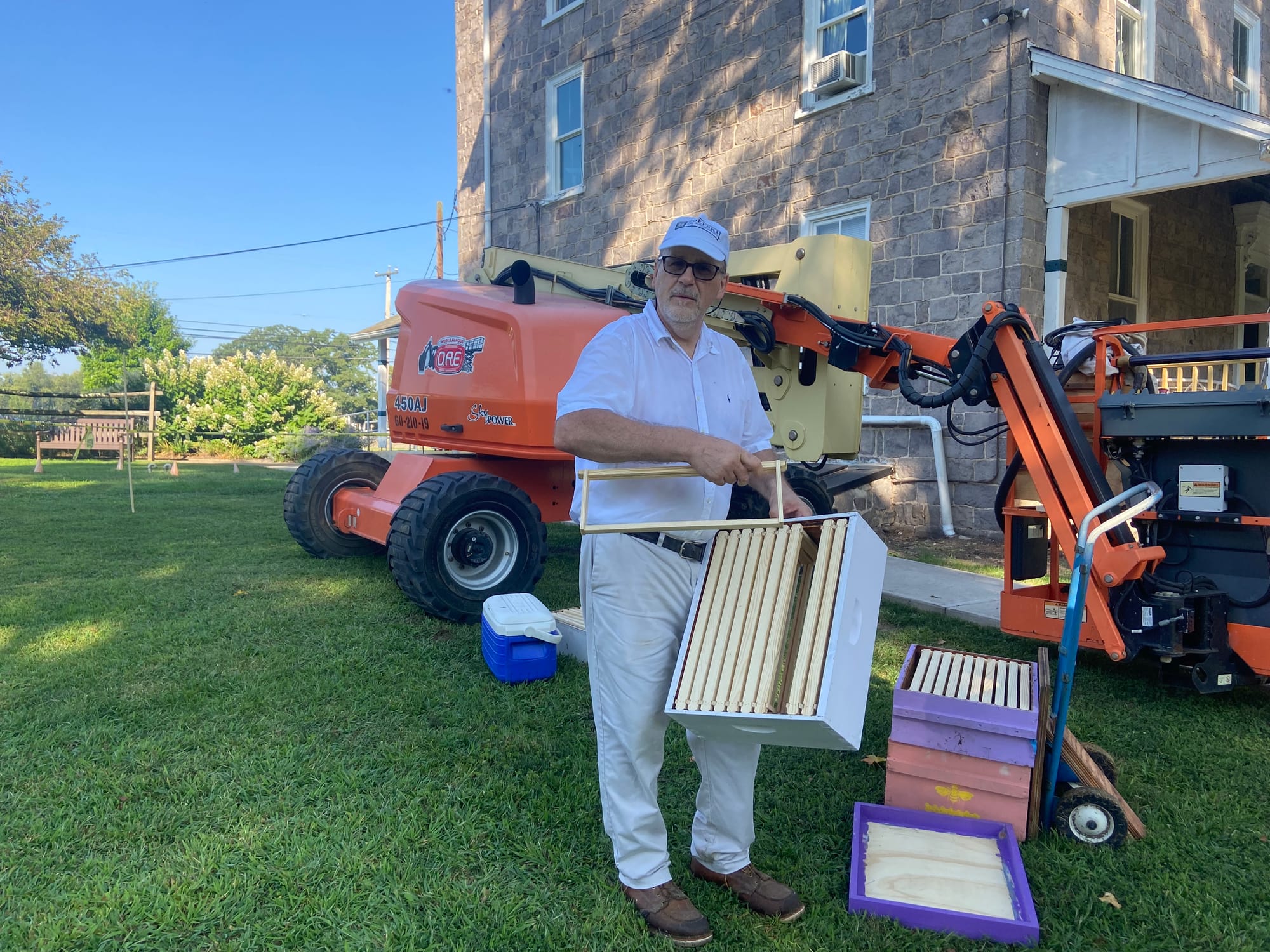James Zdepski, a beekeeper and carpenter, removed a colony of bees Wednesday from the Riegelsville's borough hall.