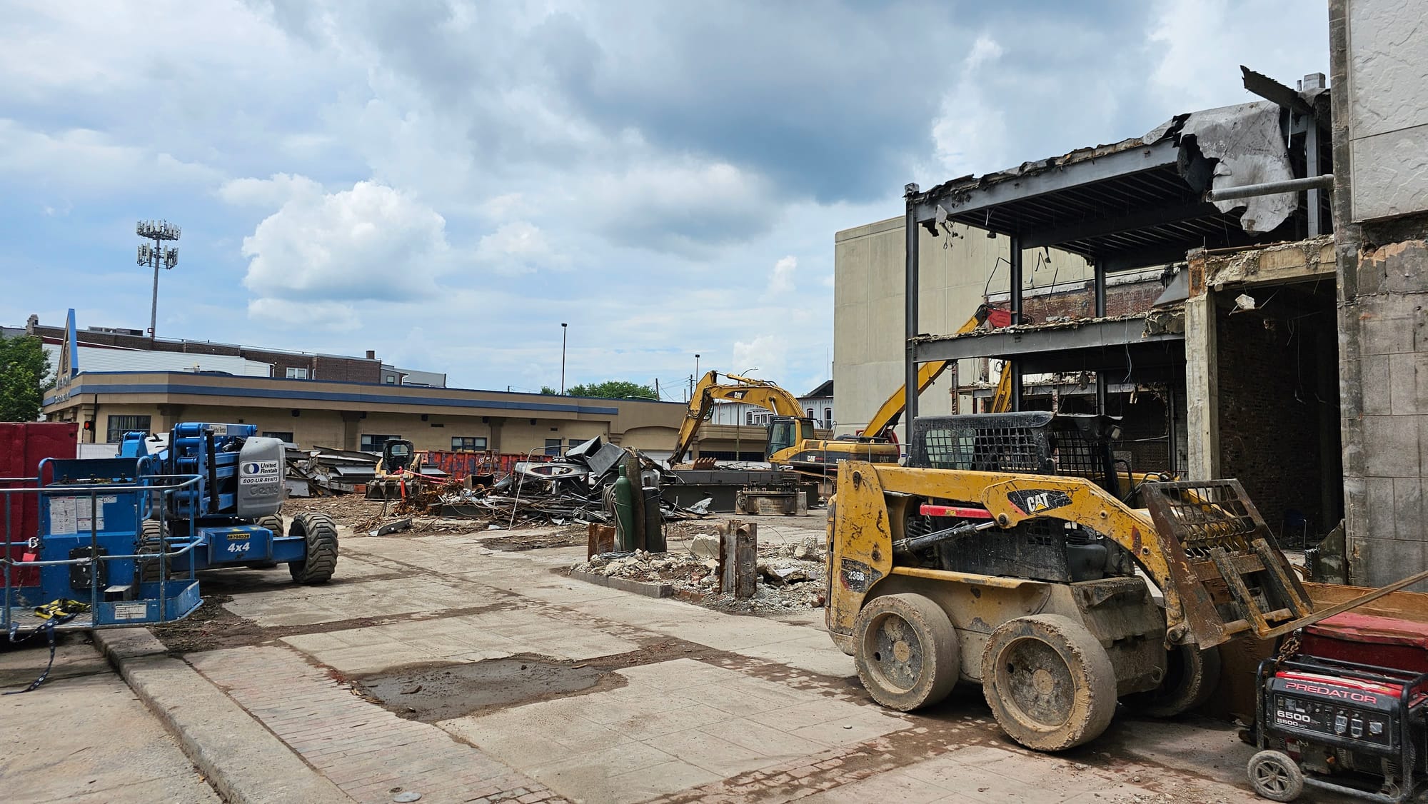 Demolition crews are tearing down a row of buildings in the 900 block of Hamilton Street, where City Center is planning a fiv