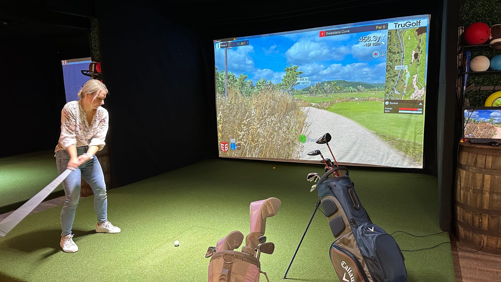 A golfer navigates the greens at Twisted Tees.