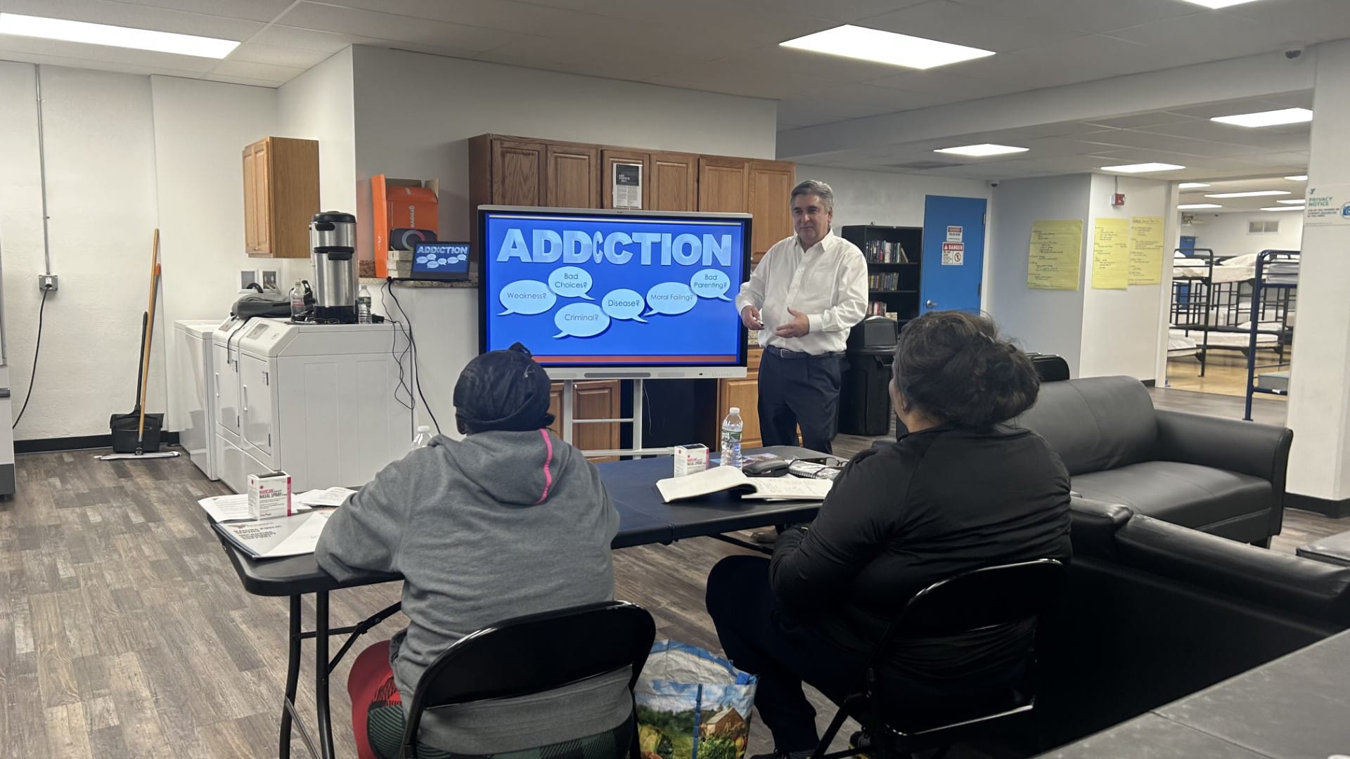 Steve Forzato addresses staff at Allentown’s only warming station during a program about how to engage someone in active addi