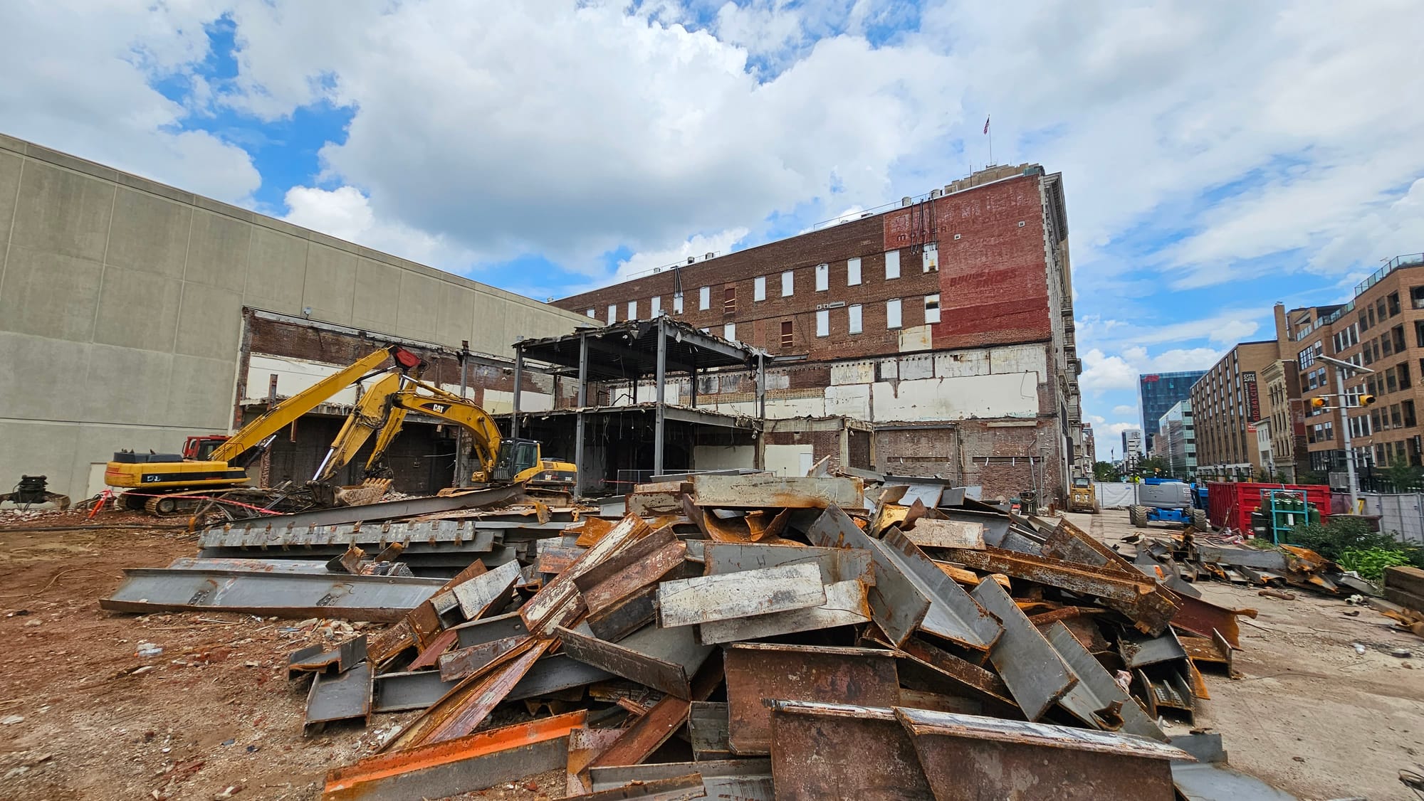 Demolition crews are tearing down a row of buildings in the 900 block of Hamilton Street, where City Center is planning a fiv