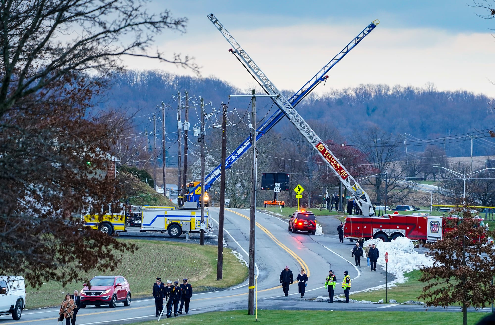 The scene along rt. 309 near Northwestern Lehigh Middle School. Mourners gather at Northwestern Lehigh Middle School in New T
