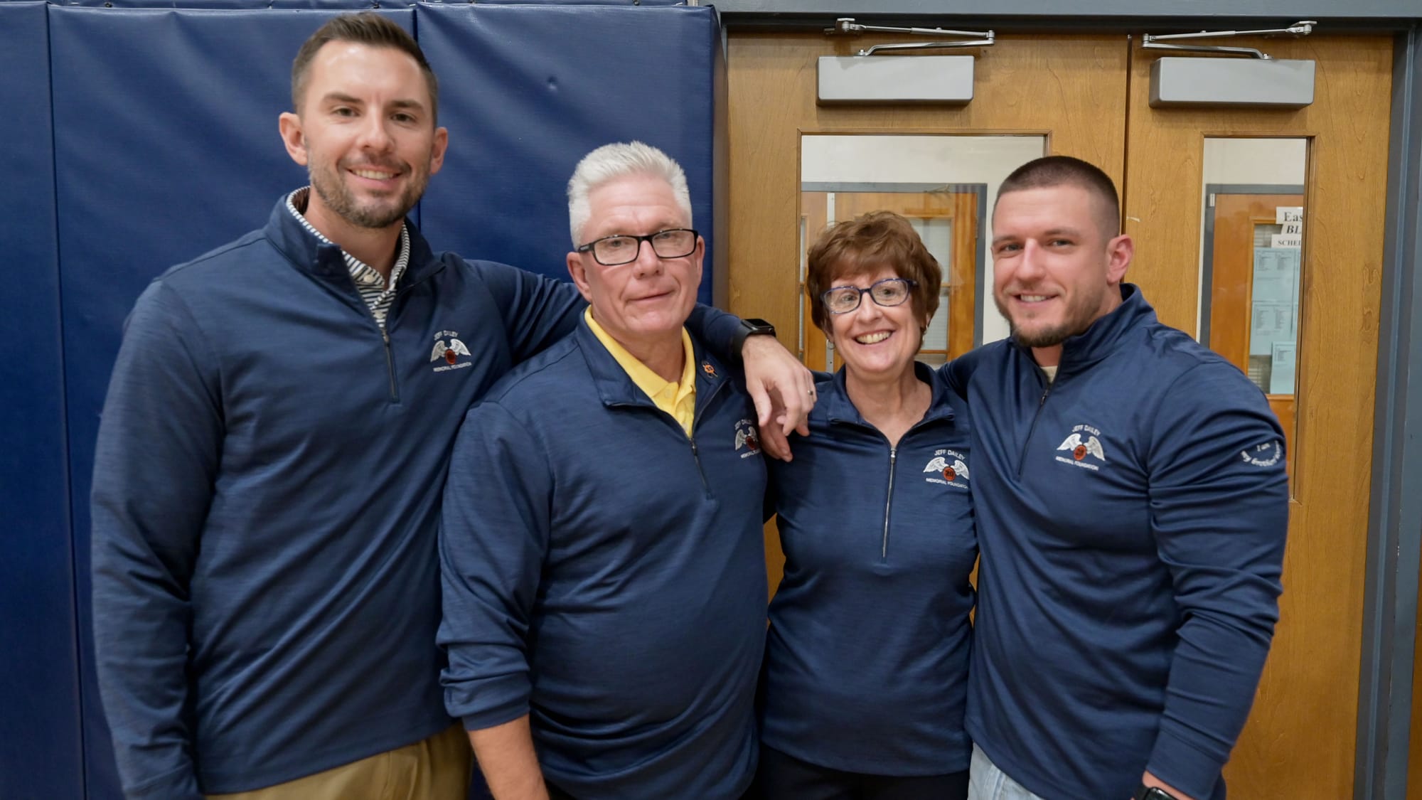 The Dailey family, left, Chris, Bobby, Jane and T.J., gather before a court dedication for Jeff Dailey on Friday, December 1,