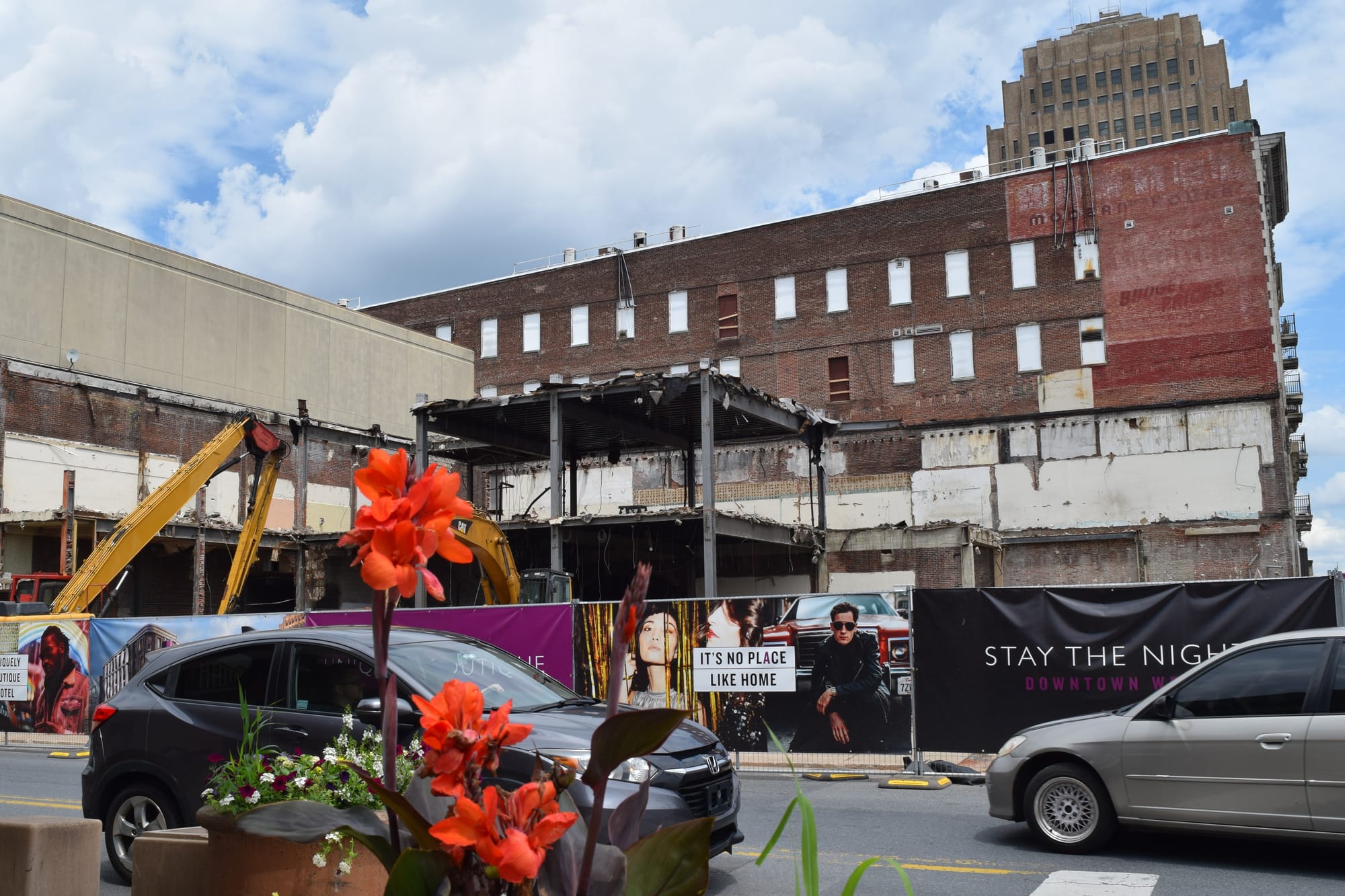 Demolition crews are tearing down a row of buildings in the 900 block of Hamilton Street, where City Center is planning a fiv