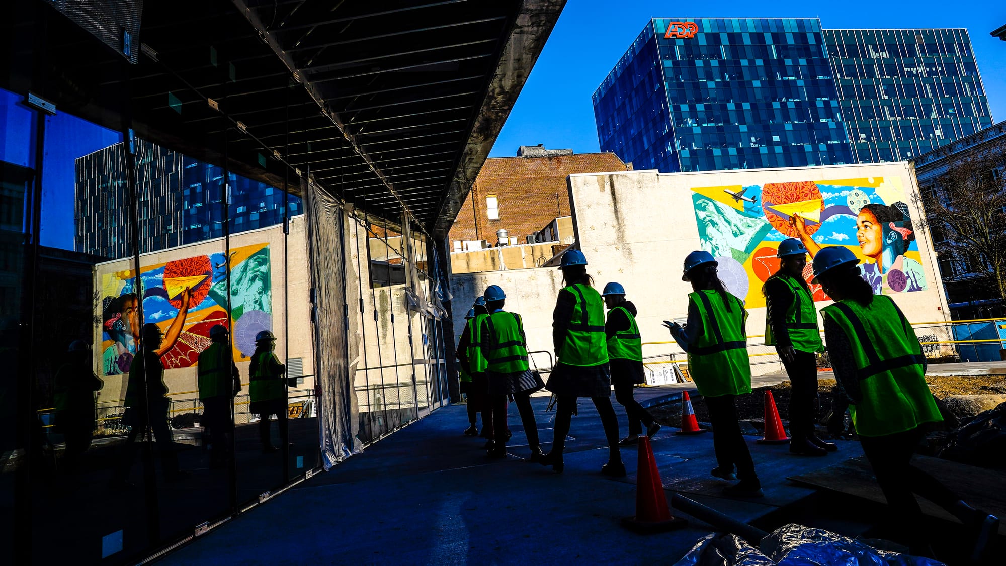 Representatives of the Da Vinci Science Center lead members of the Allentown School District Partnership on a tour of the new