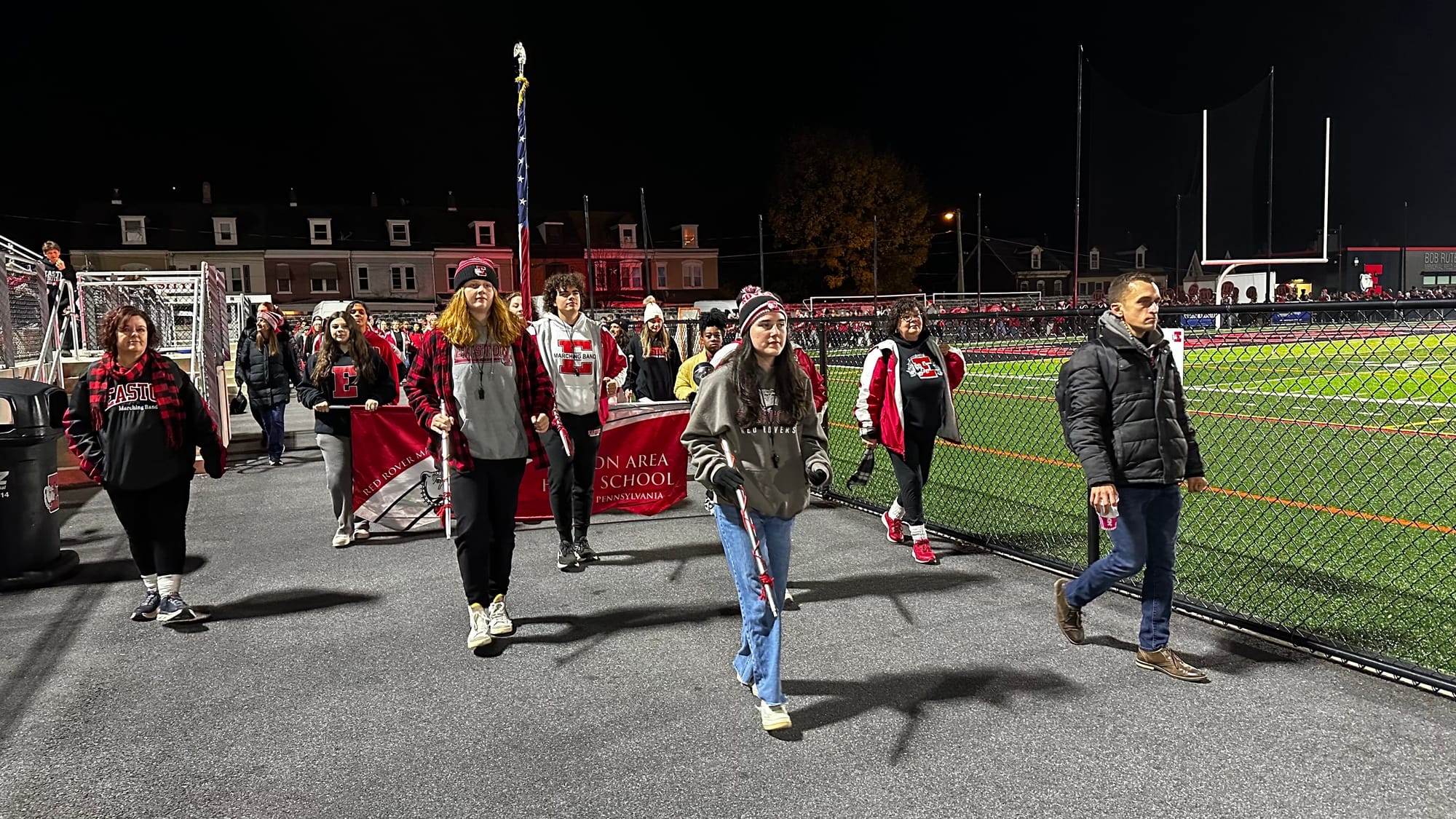Easton's band takes a turn around the perimeter of the stadium during the pep rally.