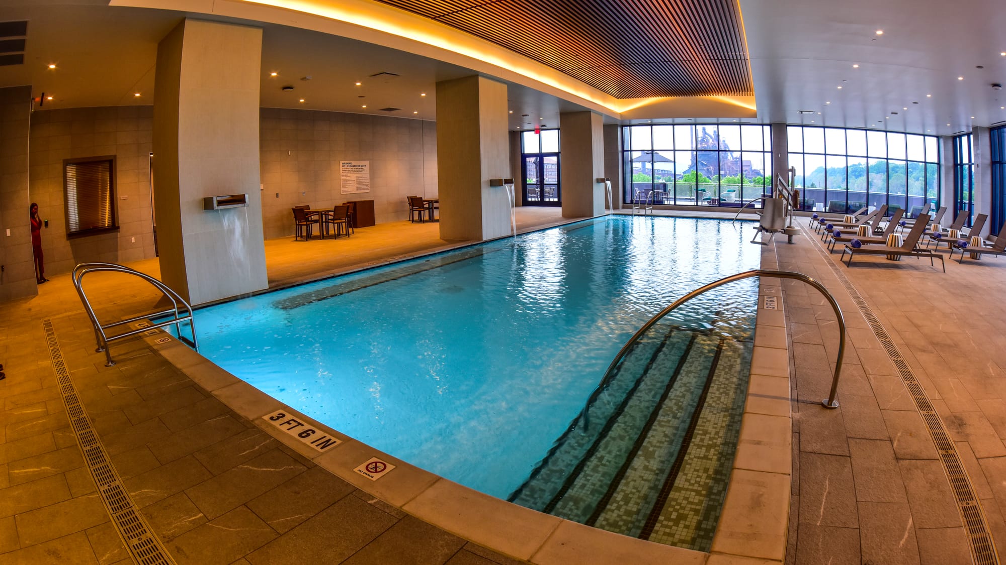 Swimming pool on top floor of Wind Creek with views of Bethlehem Steel. Wind Creek Hotel and Resort, Bethlehem, shows off $16