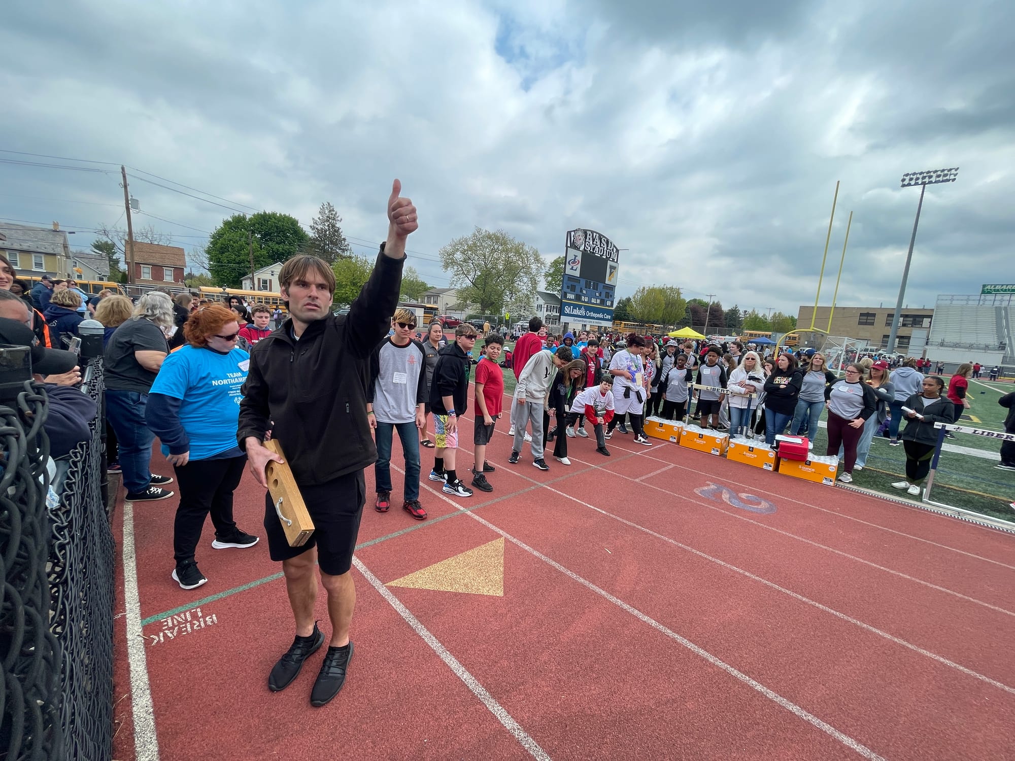 A coach gives the "all-clear" to start the races.