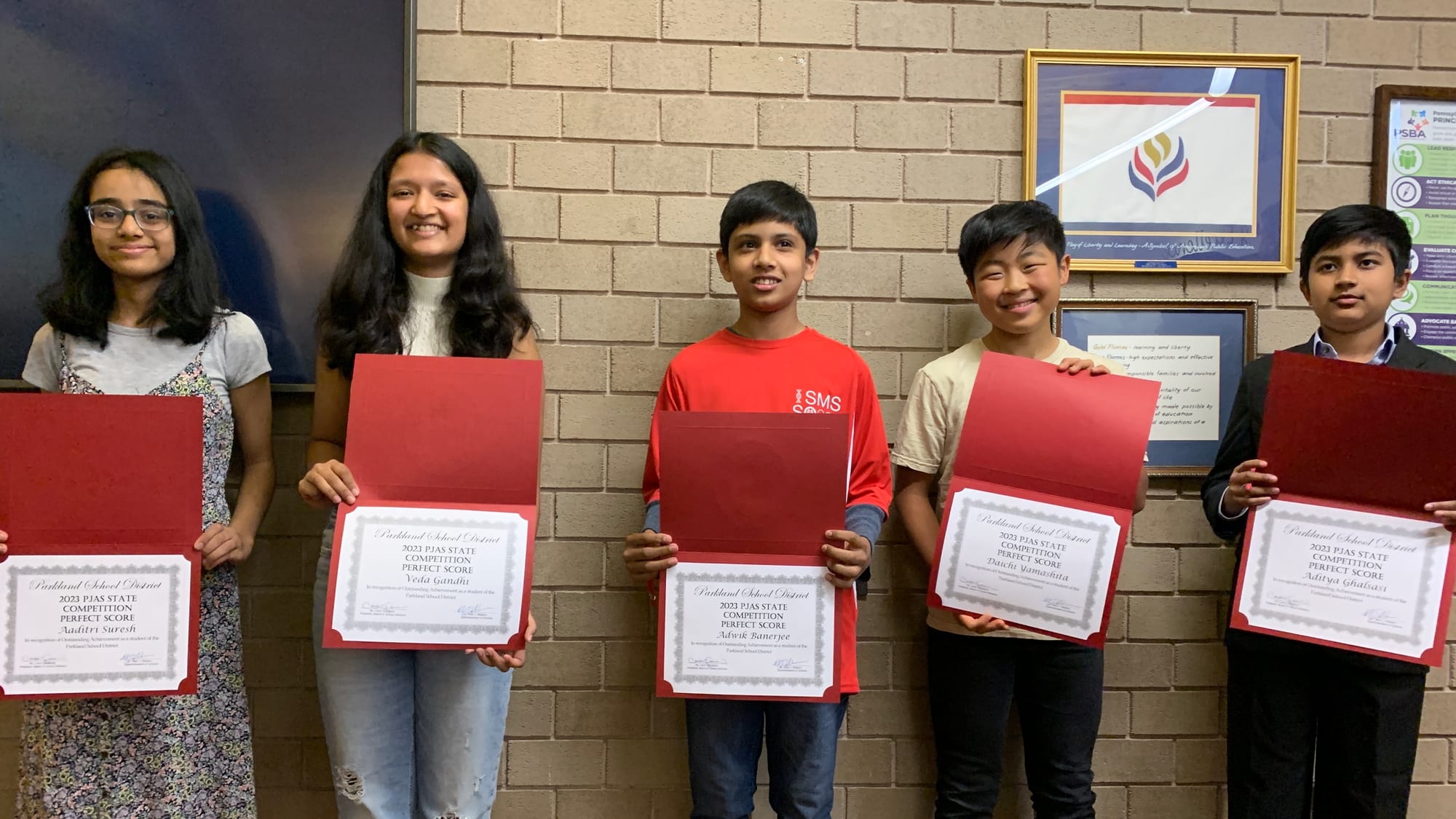 The students who won perfect scores on their Pennsylvania Junior Academy of Science projects.