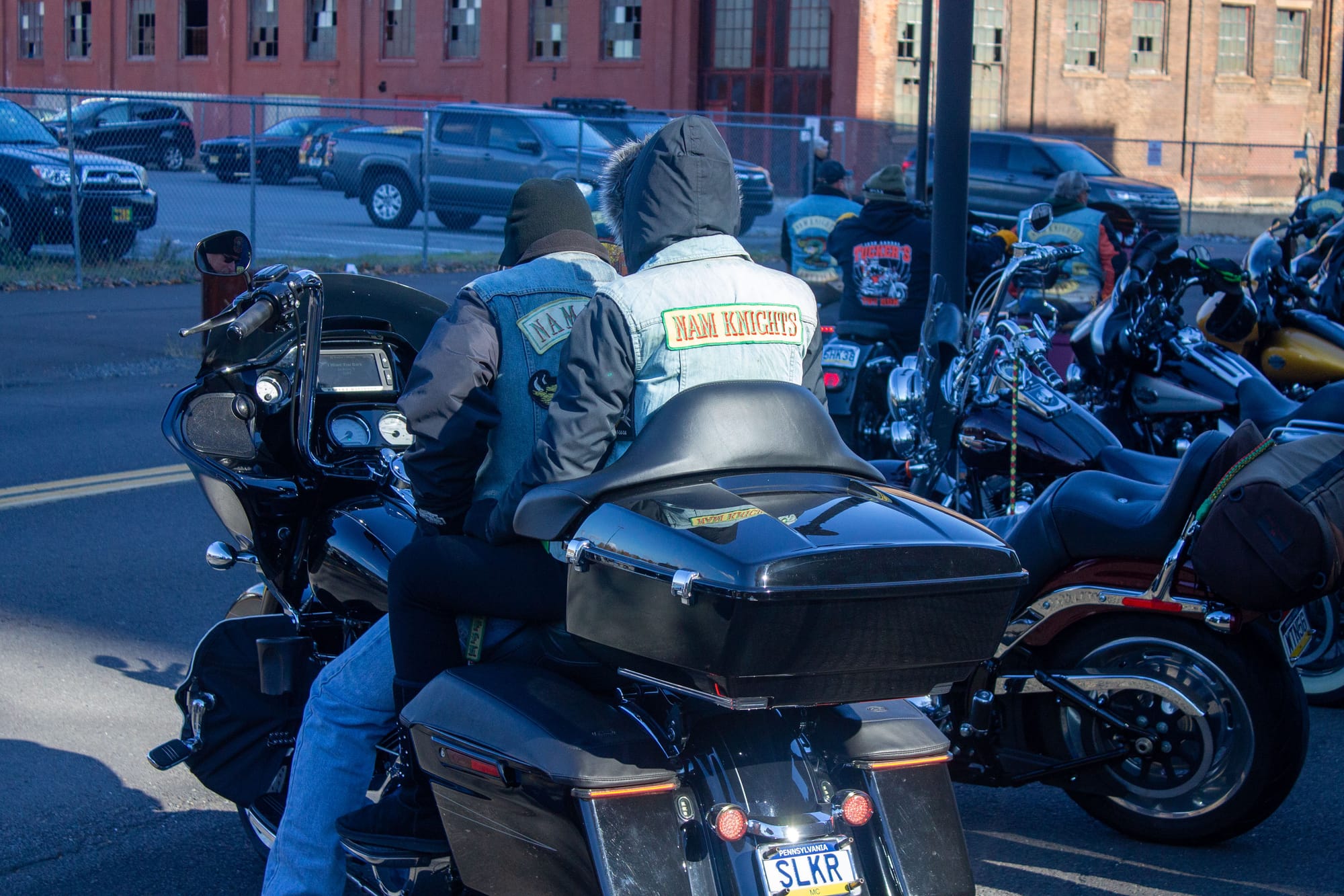 Two bikers prepare to head out after the ceremony.