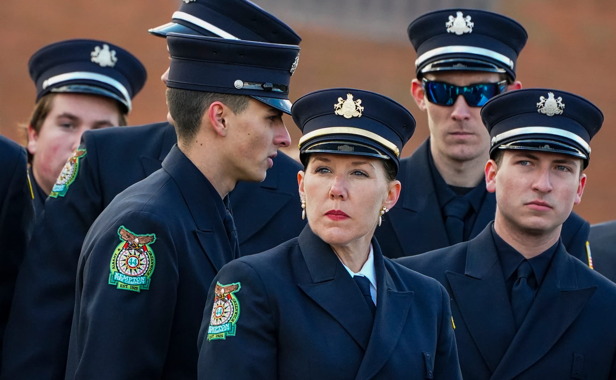 Kempton firefighters arrive Saturday. Mourners gather at Northwestern Lehigh Middle School in New Tripoli, Lehigh County, on 
