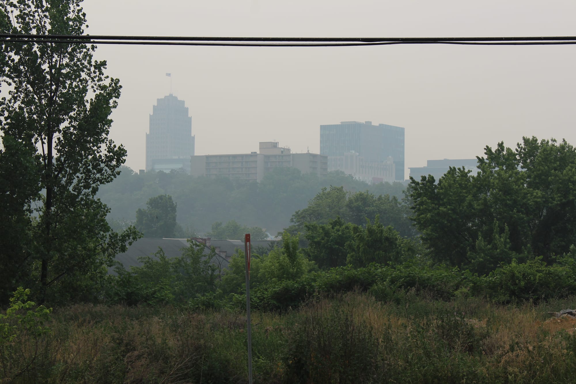 The PPL building is seen through haze in downtown Allentown.