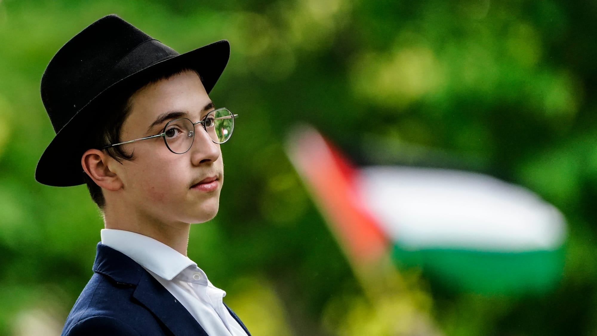 Levi Greenburg, son of Lehigh University Chabad Rabbi Zalman Greenberg, watches the rally for Palestine Friday. Student Polit