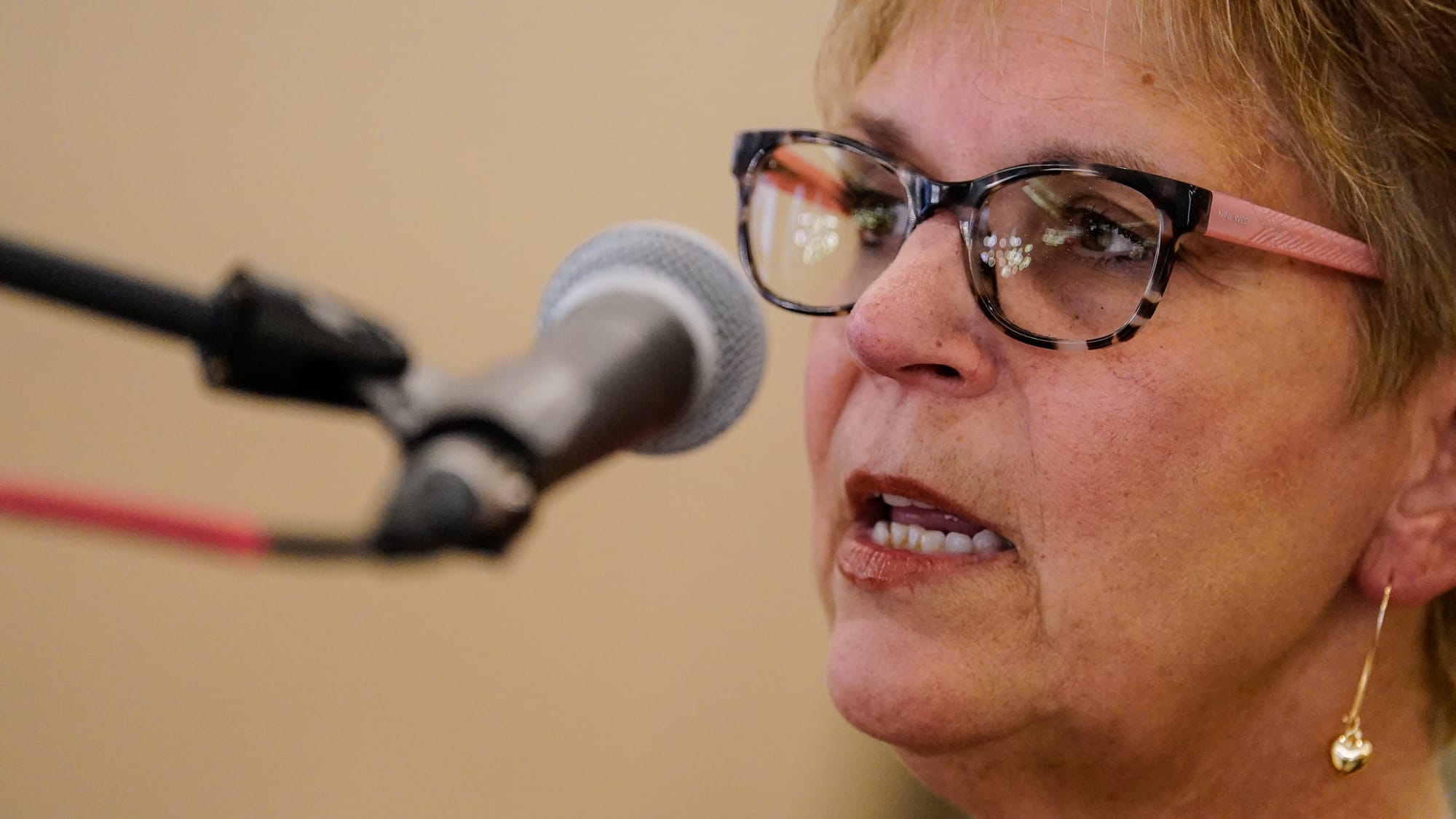 Beverly McDevitt, Allentown Diocesan Music Director, sings Thursday. Ceremonies of Reception of the Body and Visitation for T