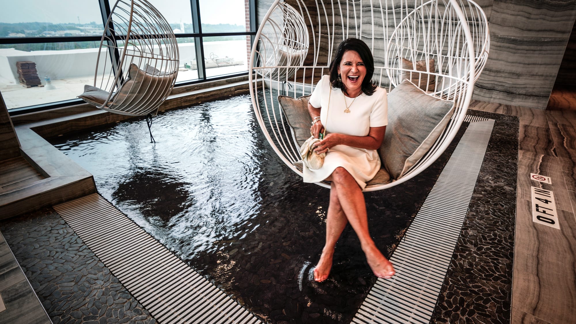 Stephanie Bryan, Tribal Chair & CEO of Poarch Band of Creek Indians, enjoys a pool on the top floor of Wind Creek Thursday. W