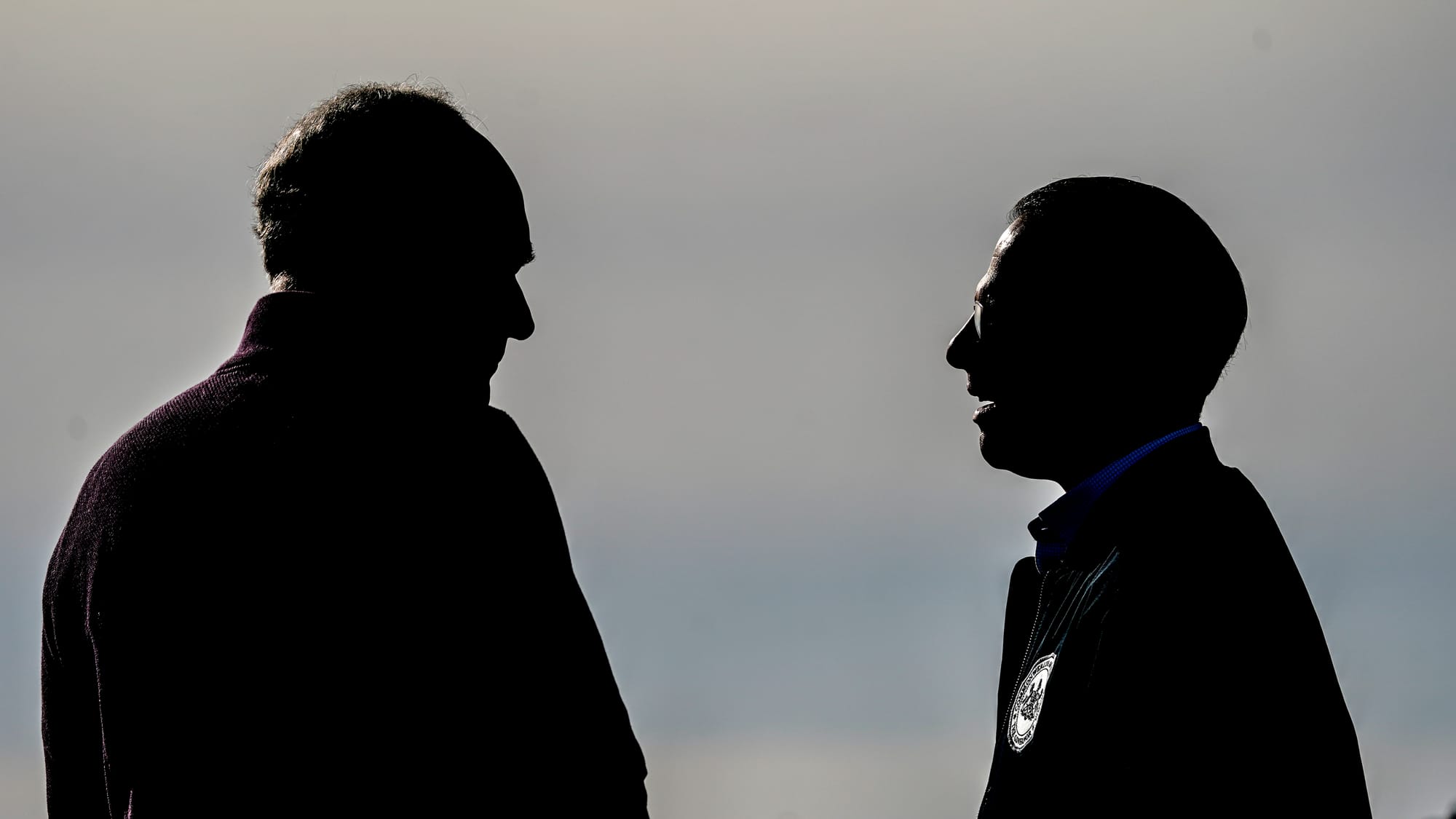 Pa. Sen. Bob Casey, left, and Pa. Gov. Josh Shapiro await President Biden. President Joseph Biden lands at Lehigh Valley Inte