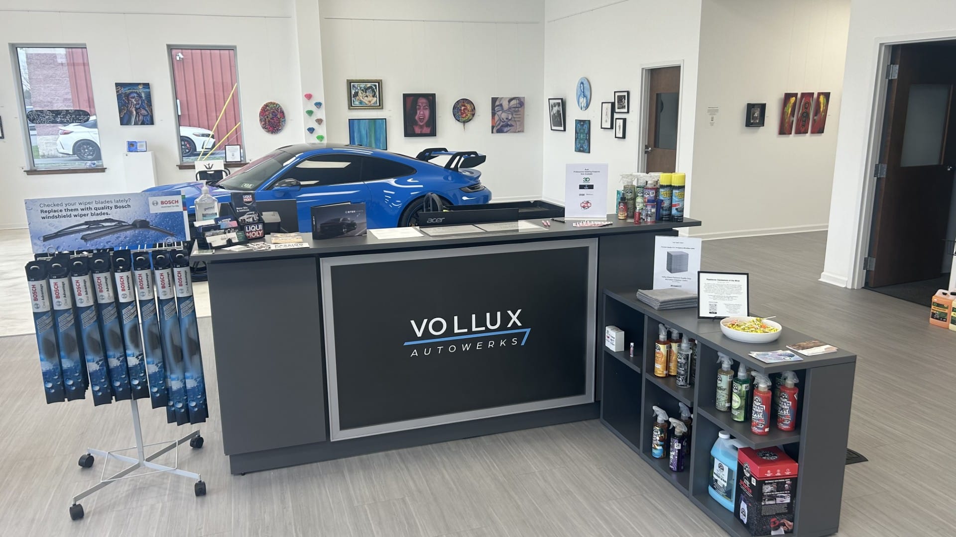 Midnight Gallery is in the showroom of Vollux Autowerks, a car repair and diagnostics shop in Schnecksville. The latest art s