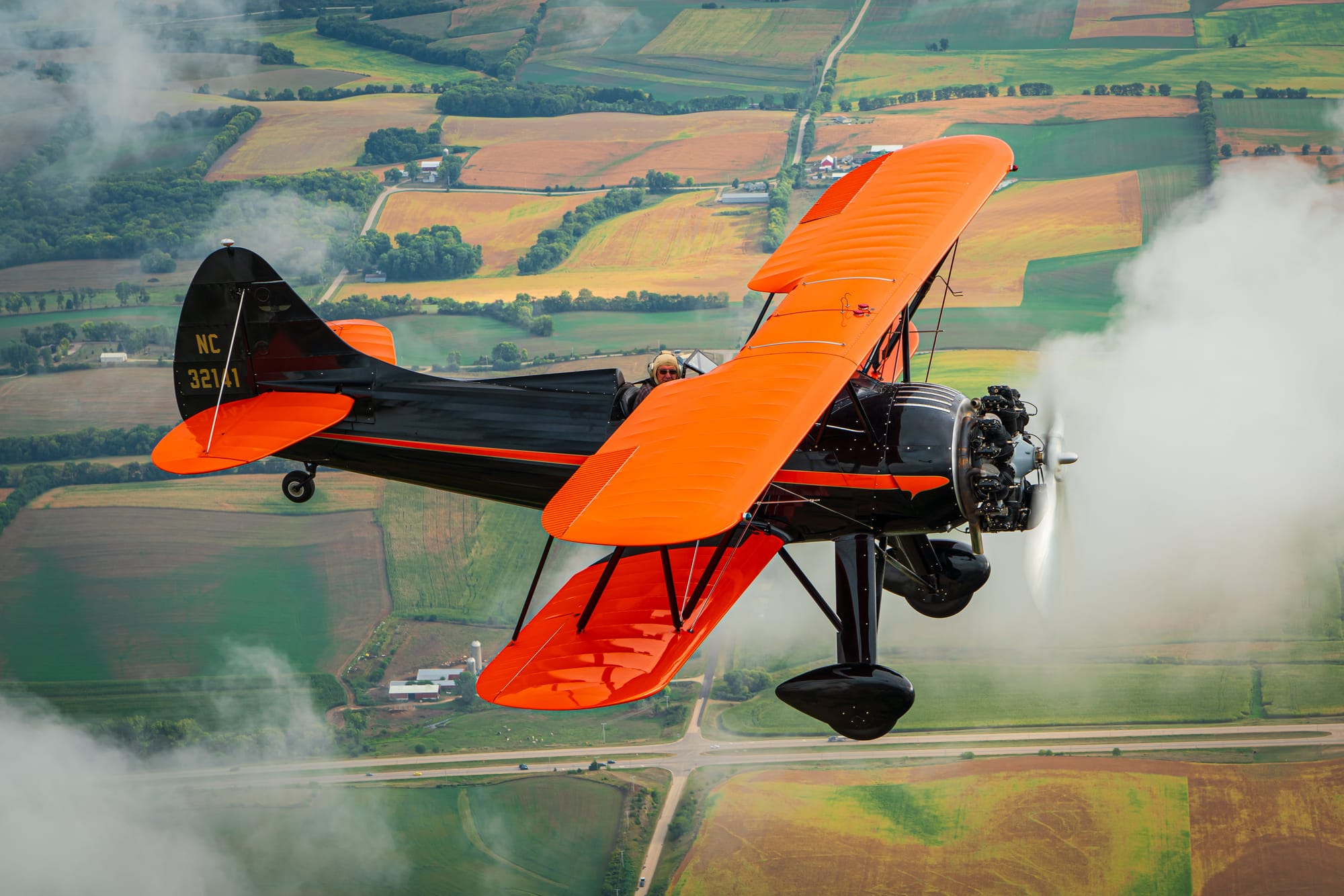 Dan Wilkins flying his WACO UPF-7 Biplane.