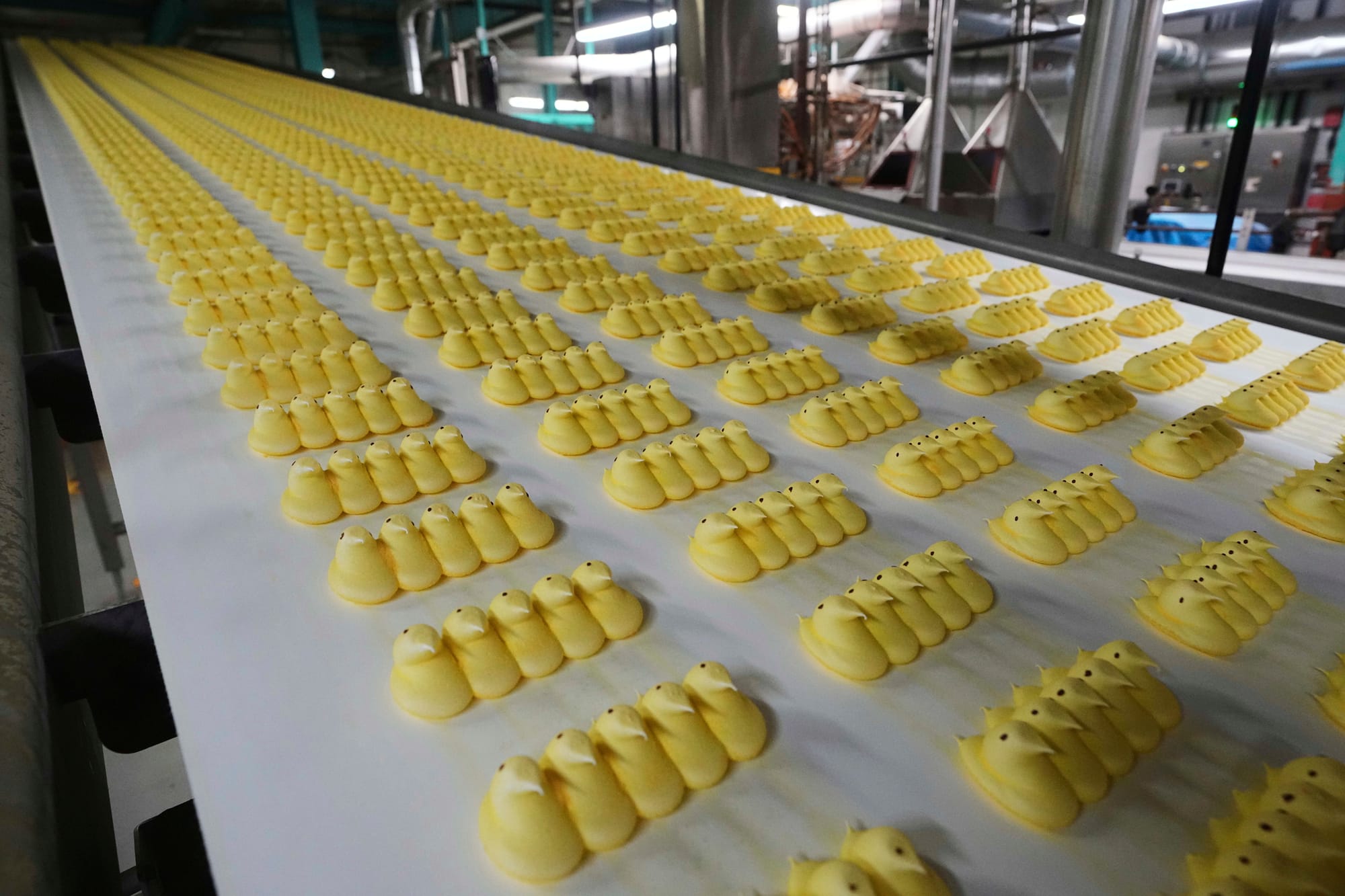 Peeps marshmallow treats move through the manufacturing process at the Just Born factory in Bethlehem, Pa., Thursday, April 1