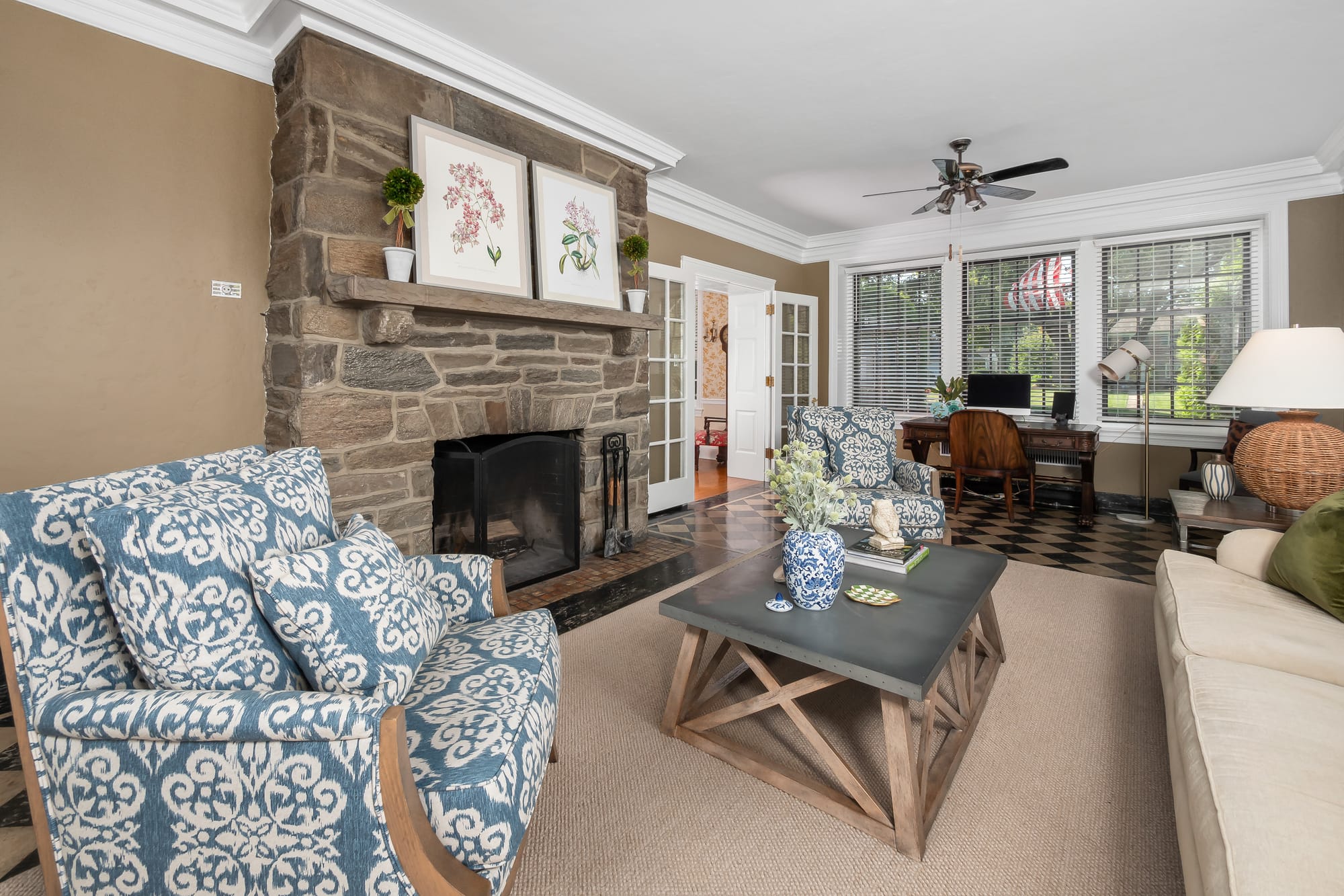 The 3-story Federal-Style Georgian Colonial mansion at 1880 W Union Boulevard sits on 1.27 acres and boasts a grand staircase