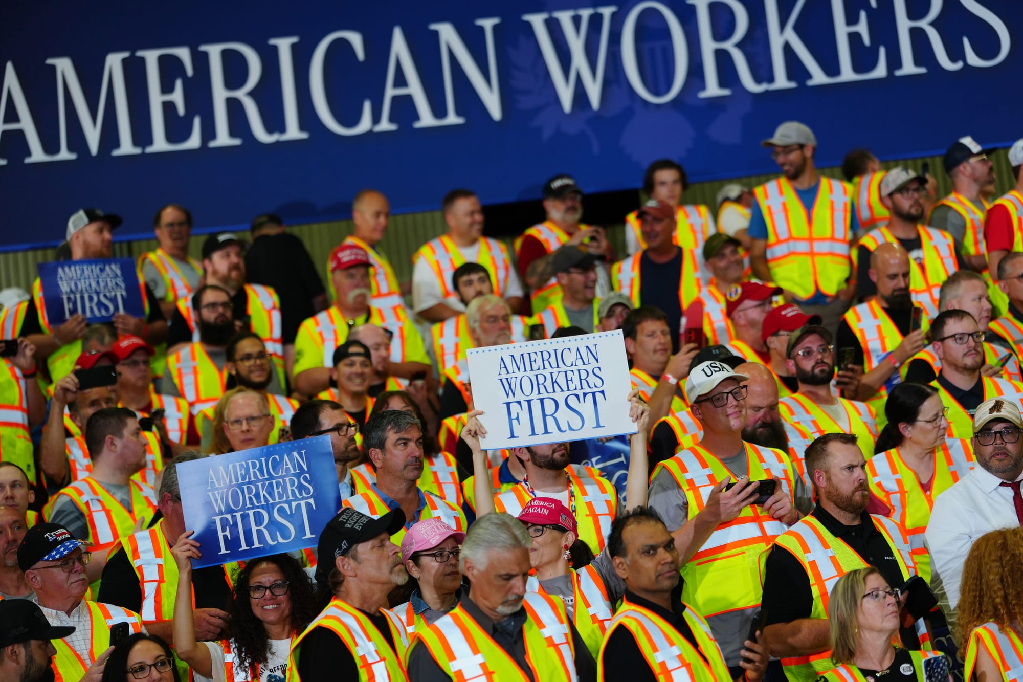 Attendees wait for President Donald Trump to speak at a Mack Trucks facility, Tuesday, June 23, 2026, in Macungie, Pa.