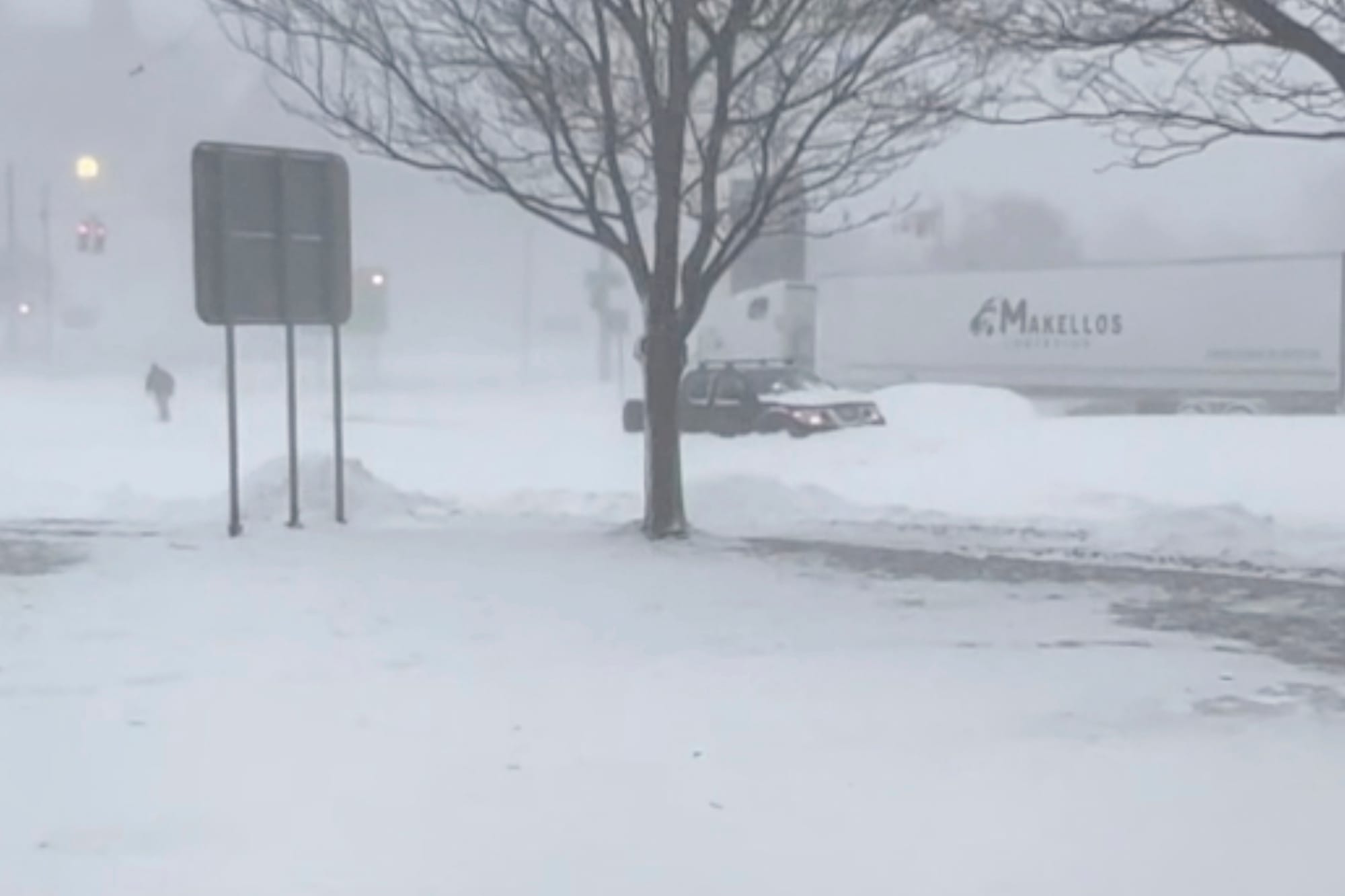 High winds and snow covers the streets and vehicles in Buffalo, N.Y. on Sunday, Dec. 25, 2022. Millions of people hunkered do