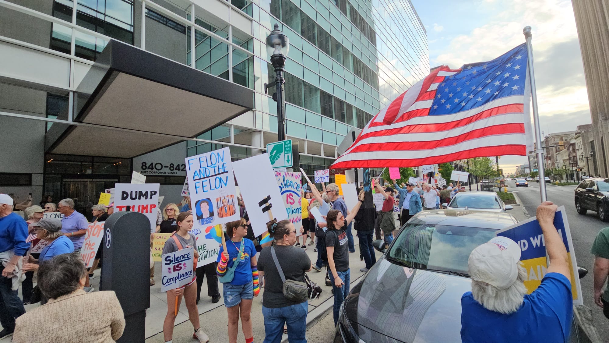 Protesters demonstrate Thursday, May 1, outside the office U.S. Rep. Ryan Mackenzie shares with Sen. Dave McCormick in the Bu
