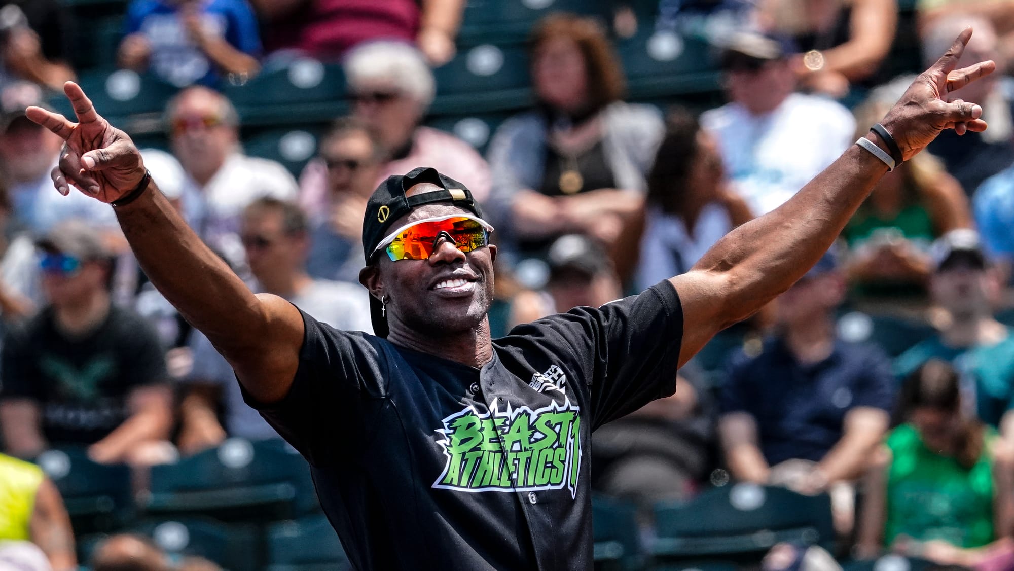 Terrell Owens greets the crowd. The 2nd annual DeVonta Smith Celebrity Softball Game was held at Coca-Cola Park in Allentown 